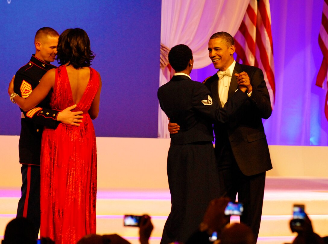 President Barack Obama dances with Air Force Staff Sgt. Bria Nelson, and First Lady Michelle Obama dances with Marine Corps Gunnery Sgt. Timothy Easterling during the Commander in Chief Ball at the Walter E. Washington Convention Center in Washington, D.C., Jan. 21. DOD photo by Army Sgt. 1st Class Tyrone C. Marshall Jr.