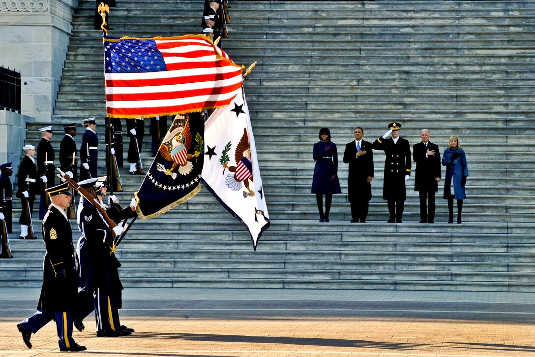 Members of the Joint Armed Forces Color Guard perform pass in review for President Barack Obama, First Lady Michelle Obama, Vice President Joe Biden and his wife, Dr. Jill Biden, during the 57th Inauguration Day parade in Washington, D.C., Jan. 21, 2013.
