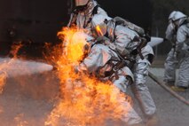 Aircraft Rescue and Firefighting Marines aboard Marine Corps Air Station New River battled a blaze during a live-fire training exercise, Jan. 17. The Marines took turns rotating through each role of the firefighter, gaining valuable experience and confidence.