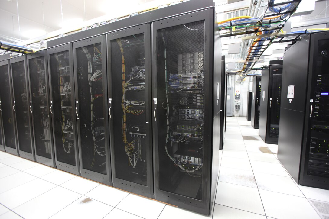 The server room at a new complex containing the Marine Air Ground Task Force Information Technology Support Center, known as MITSC or the MAGTF IT Support Center, aboard Marine Corps Base Camp Lejeune is kept cool and powered at all times to ensure availability to information under most circumstances. There are alternate power grids available to keep the facility active in the event of a storm or loss of power. 