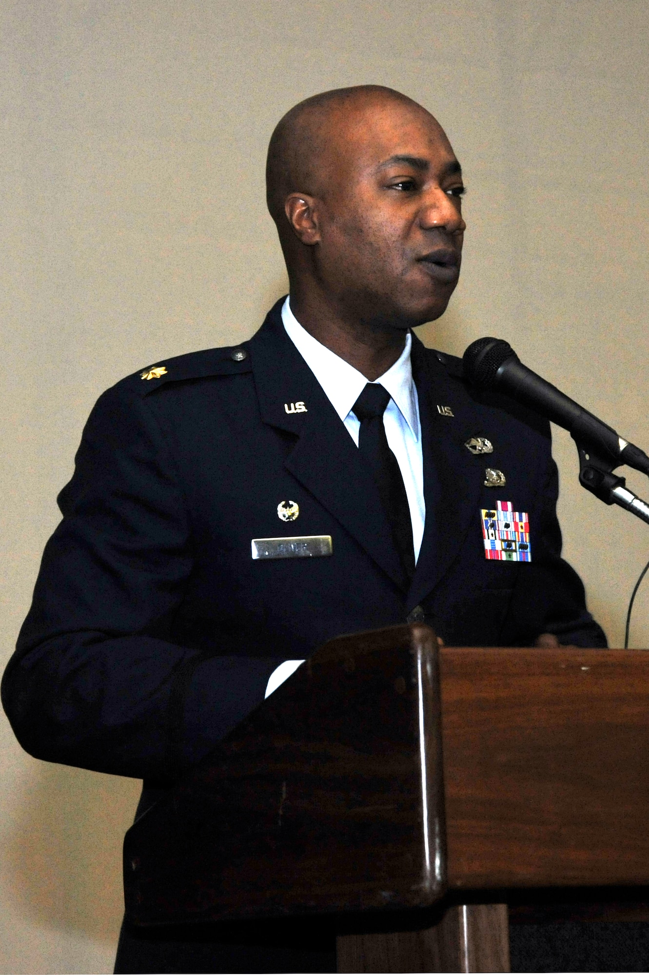 Maj. Steven Oliver, 51st Maintenance Operations Squadron commander, commemorates Dr. Martin Luther King Jr. at the Special Birthday Observance at the base theater on Osan Air Base, Republic of Korea, Jan. 23 2013. Oliver spoke about Dr. King’s trials to achieve his goal of ensuring the civil rights movement was a success. (U.S. Air Force photo/Staff Sgt. Emerson Nuñez)