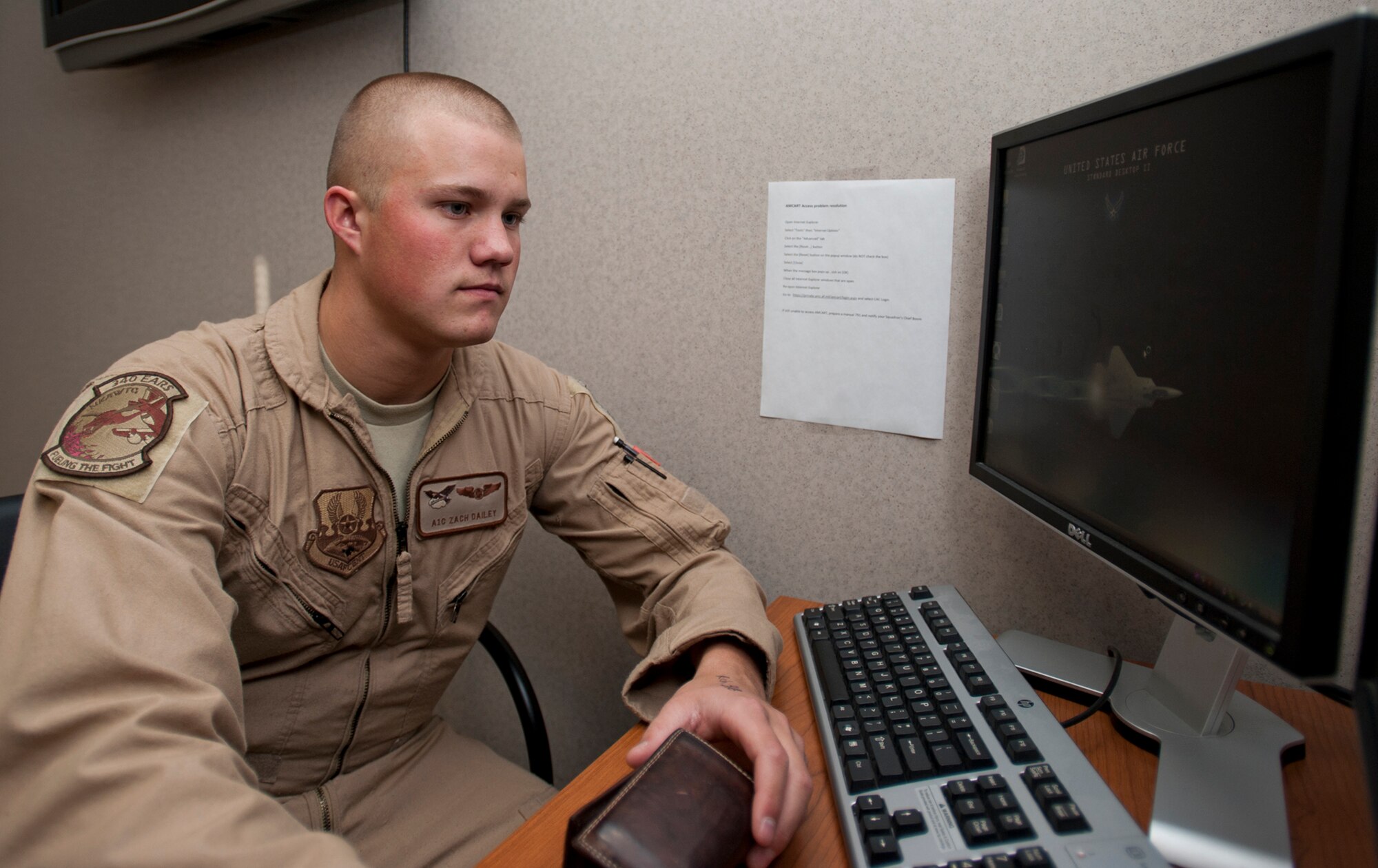 Airman 1st Class Zachery Dailey, 344th Air Refueling Squadron boom operator, looks over a pre-deployment checklist Jan. 22, 2013, McConnell Air Force Base, Kan. Dailey, who recently deployed overseas, was selected as the spotlight performer for the week of Jan. 21 to 25, for his dedication to the 22nd Air Refueling Wing commander’s intents. (U.S. Air Force photo/Airman 1st Class Victor J. Caputo)