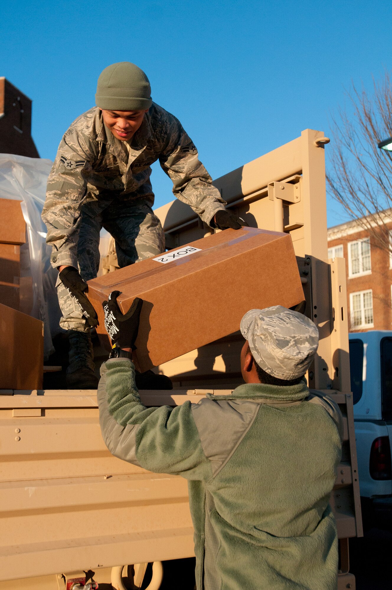 Airman 1st Class Reymart Relos of the Kentucky Air National Guard’s 123rd Force Support Squadron in Louisville, Ky., unloads food and water at McKinley Technology High School in Washington, D.C., on Jan. 18, 2013. Relos was one of nine Kentucky Air Guardsmen who deployed to the nation’s capital to provide food and lodging for National Guard members supporting the inauguration of President Barack Obama. (Kentucky Air National Guard photo by Senior Airman Vicky Spesard)