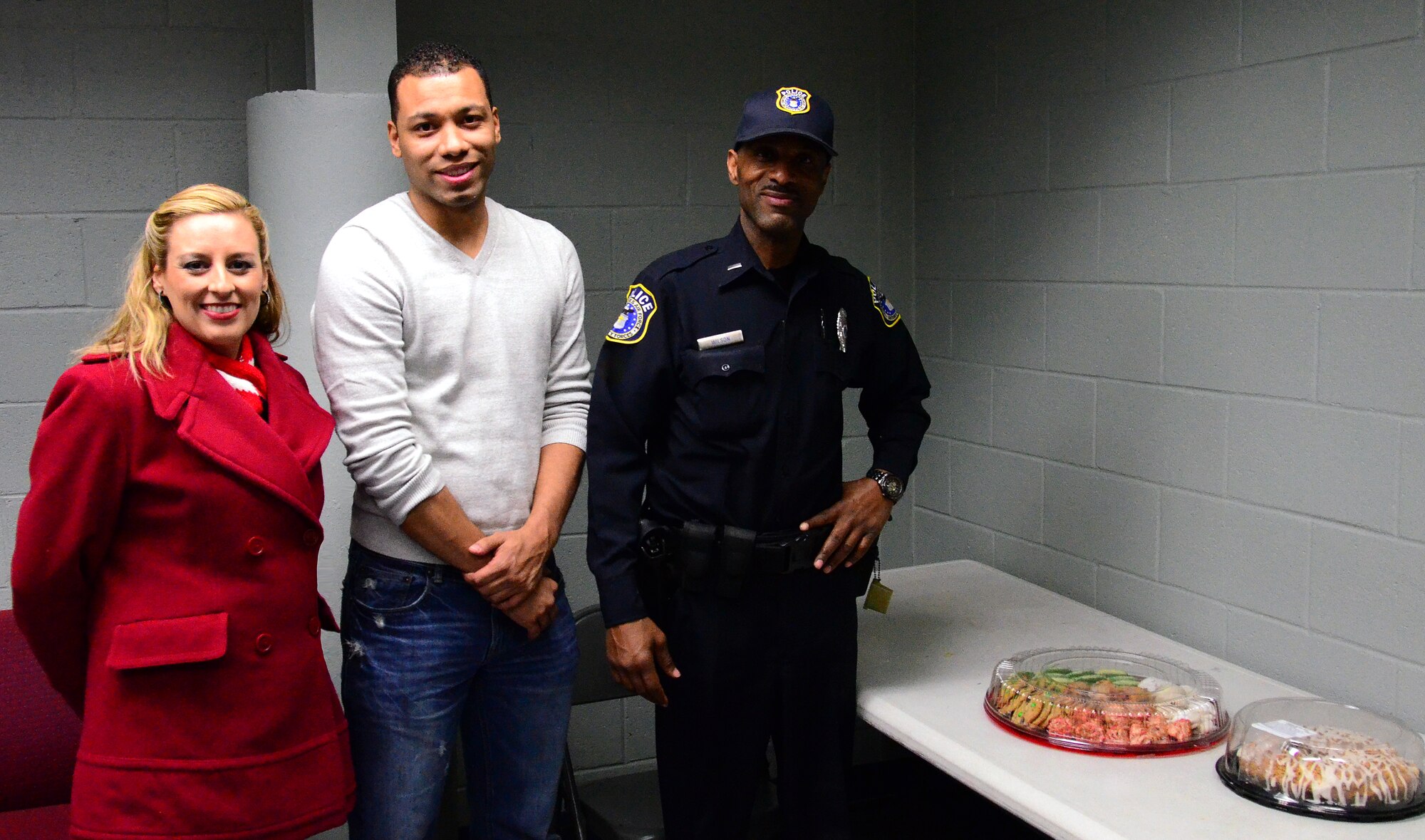 Master Sgt. Elena Lund, 94th Airlift Wing law office superintendent, and Tech Sgt. Richard Conyers, 94th Equal Employment Office interim director, took time to deliver sweet treats to 94th Security Forces Squadron members on duty Christmas morning. Conyers also delivered food to the homeless over the holidays, (U.S. Air Force photo/Senior Airman Elizabeth Van Patten)