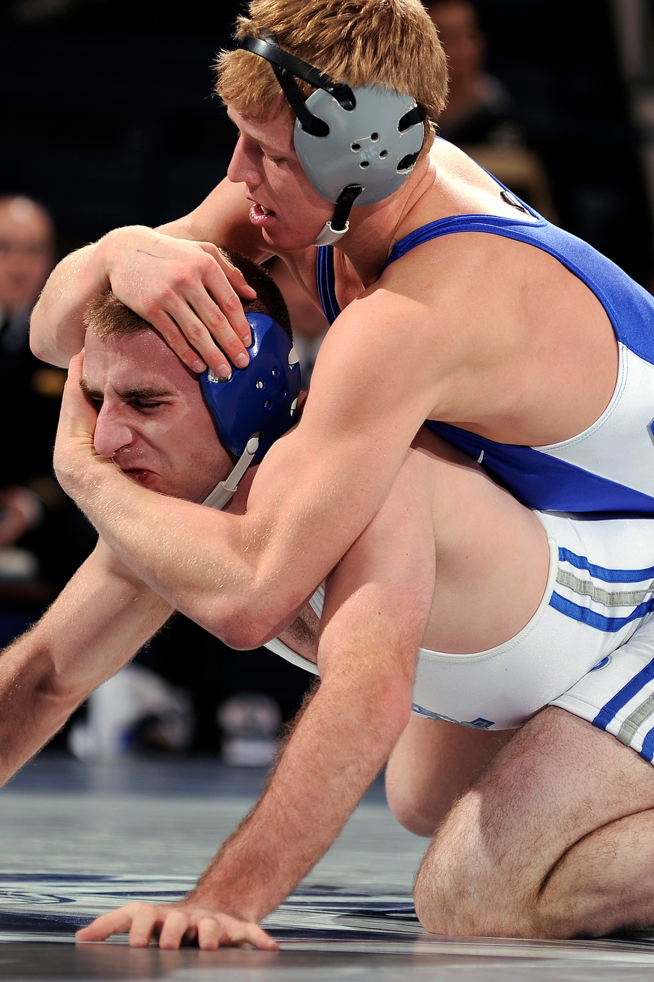 Cole VanOhlen (top) grapples with a wrestler from the U.S. Merchant Marine Academy during the All-Academy Championship Feb. 5, 2012. VanOhlen is one of the country's top wrestlers, with a 21-2 record and 12 falls -- an Air Force school record -- in the 2012-2013 season so far. (U.S. Air Force photo/Mike Kaplan)