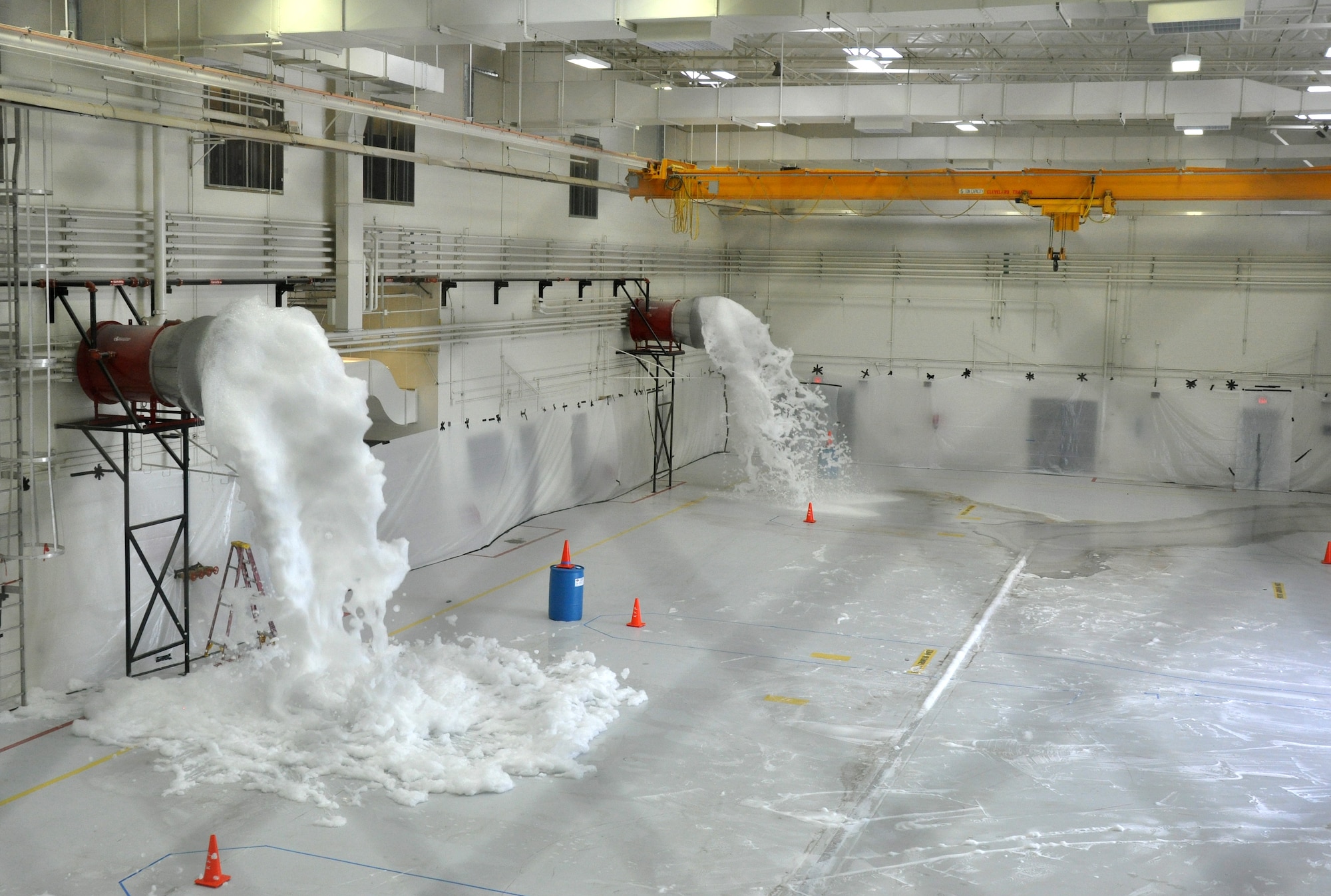 The High Expansion fire suppression system was tested in the 943rd Maintenance Squadron hangar at Davis Monthan Air Force Base, Ariz. January, 23. The test was done to ensure the fire suppression system was working properly prior to 943rd MXS Airmen moving back into the hangar.  The hangar has been undergoing major upgrades for the past year.  (U.S. Air Force Photo/ Master Sgt. Luke Johnson)