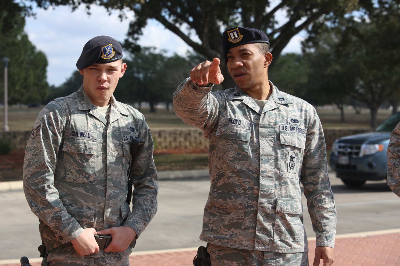 Capt. Antwan Floyd, 902nd Security Forces Squadron, discusses entry control procedures with Airman 1st Class Garrett Culwell Jan 23. at Joint Base San Antonio-Randolph.