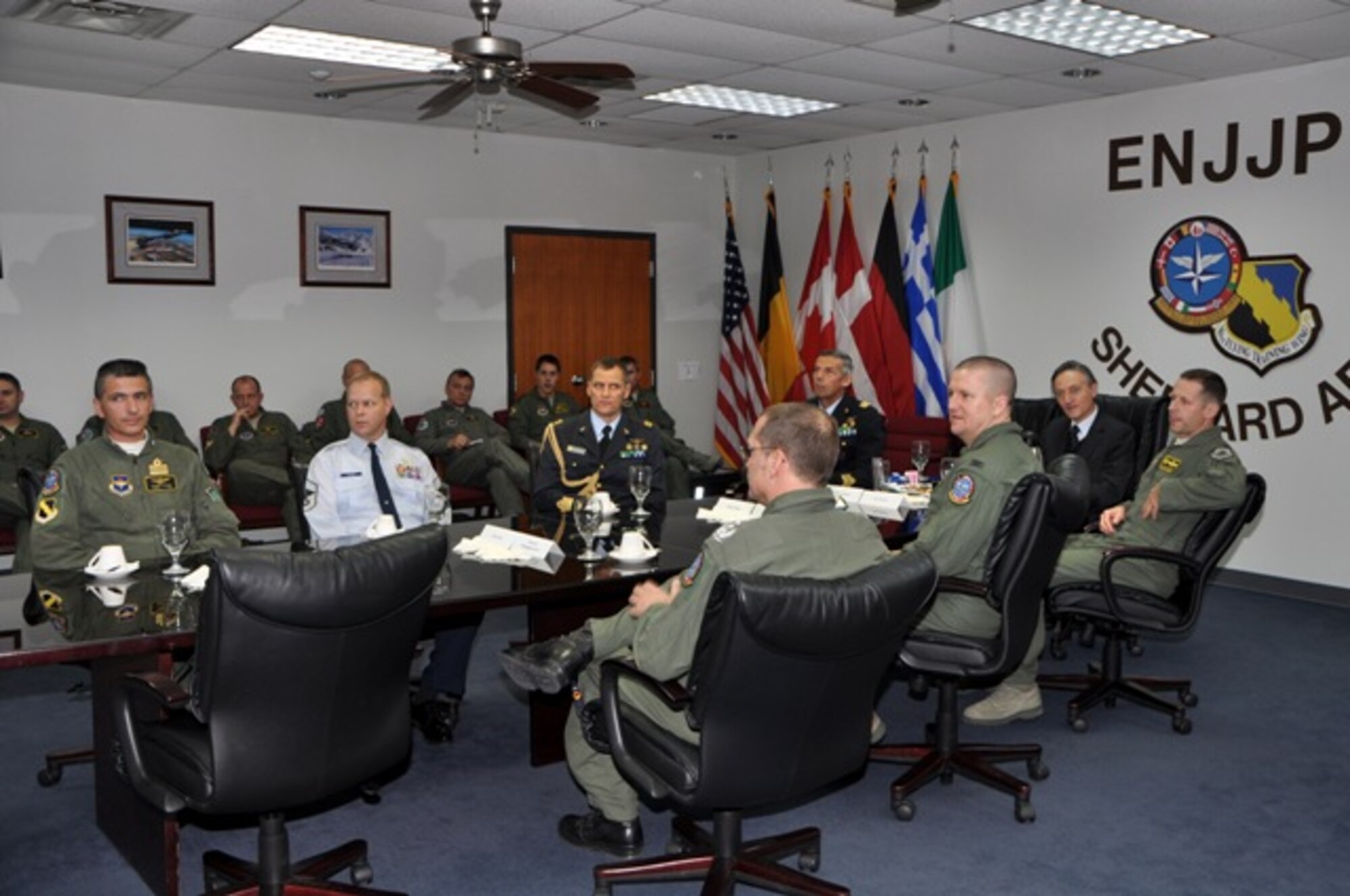 Italian ambassador to Washington Claudio Bisogniero (far right; head of table) receives a mission briefing from 80th Flying Training Wing commander Col. Dieter Bareihs during a visit Jan. 14, 2013.  The ambassador's trip to visit the Italian Air Force personnel at the Euro-NATO Joint Jet Pilot Training Program also included meetings with off-base leaders and a T-38C familiarization ride. (U.S. Air Force courtesy photo)