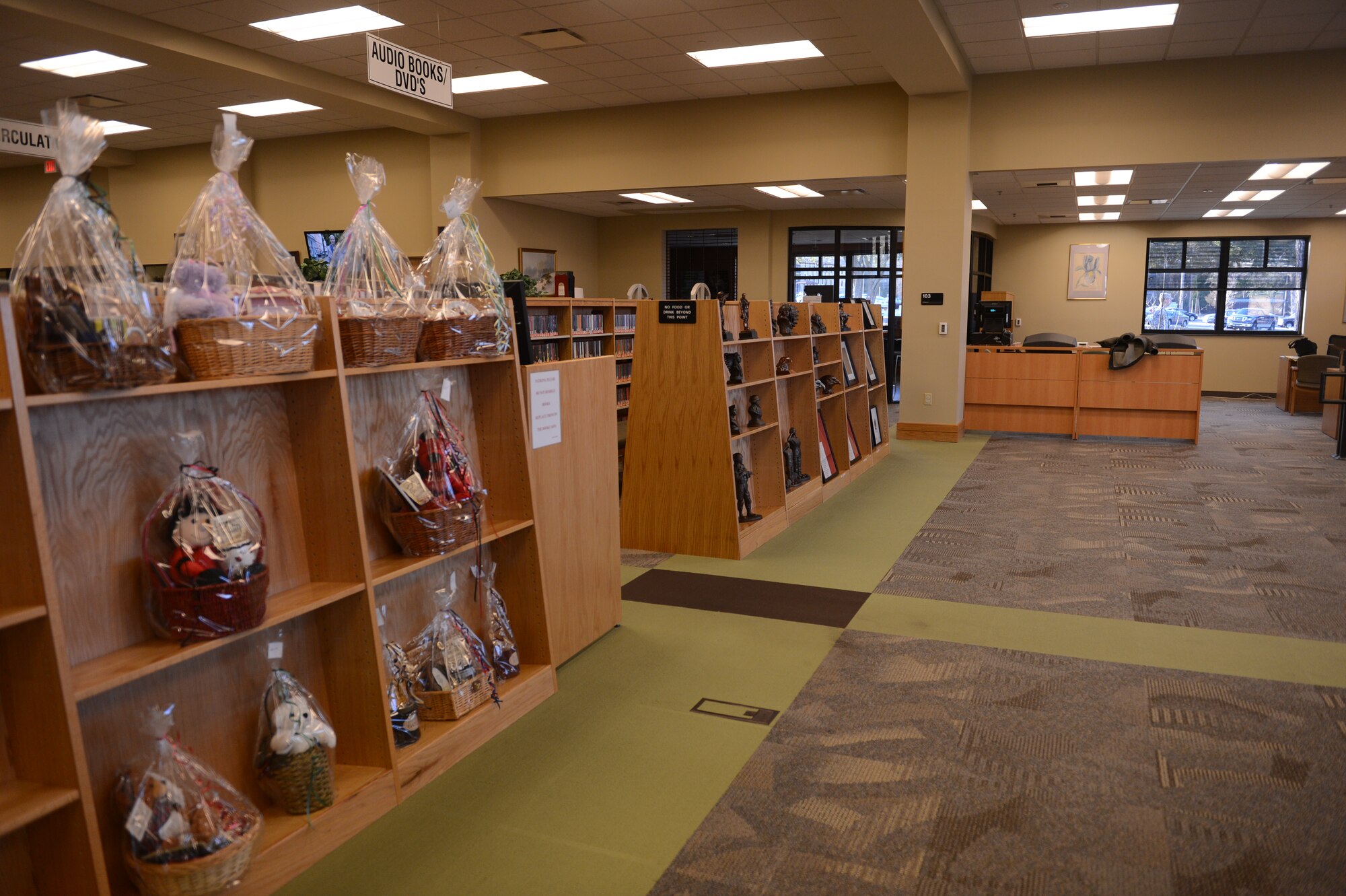 The McElveen Library, S.C., was redecorated and some of the furniture was moved to make room for new services it will be providing Jan. 22, 2013. The interior decorating is in preparation for when the library changes into the McElveen Resource Center, Feb. 1, 2013. Services previously offered at the community and arts and crafts centers are being moved to McElveen. The services being added to the library include: Information, Tickets and Travel; awards and plaques purchasing; balloon and basket sales; equipment rental; outdoor adventure trip reservations; and special events planning and coordination. (U.S. Air Force photo by Airman 1st Class Krystal M. Jeffers/Released)