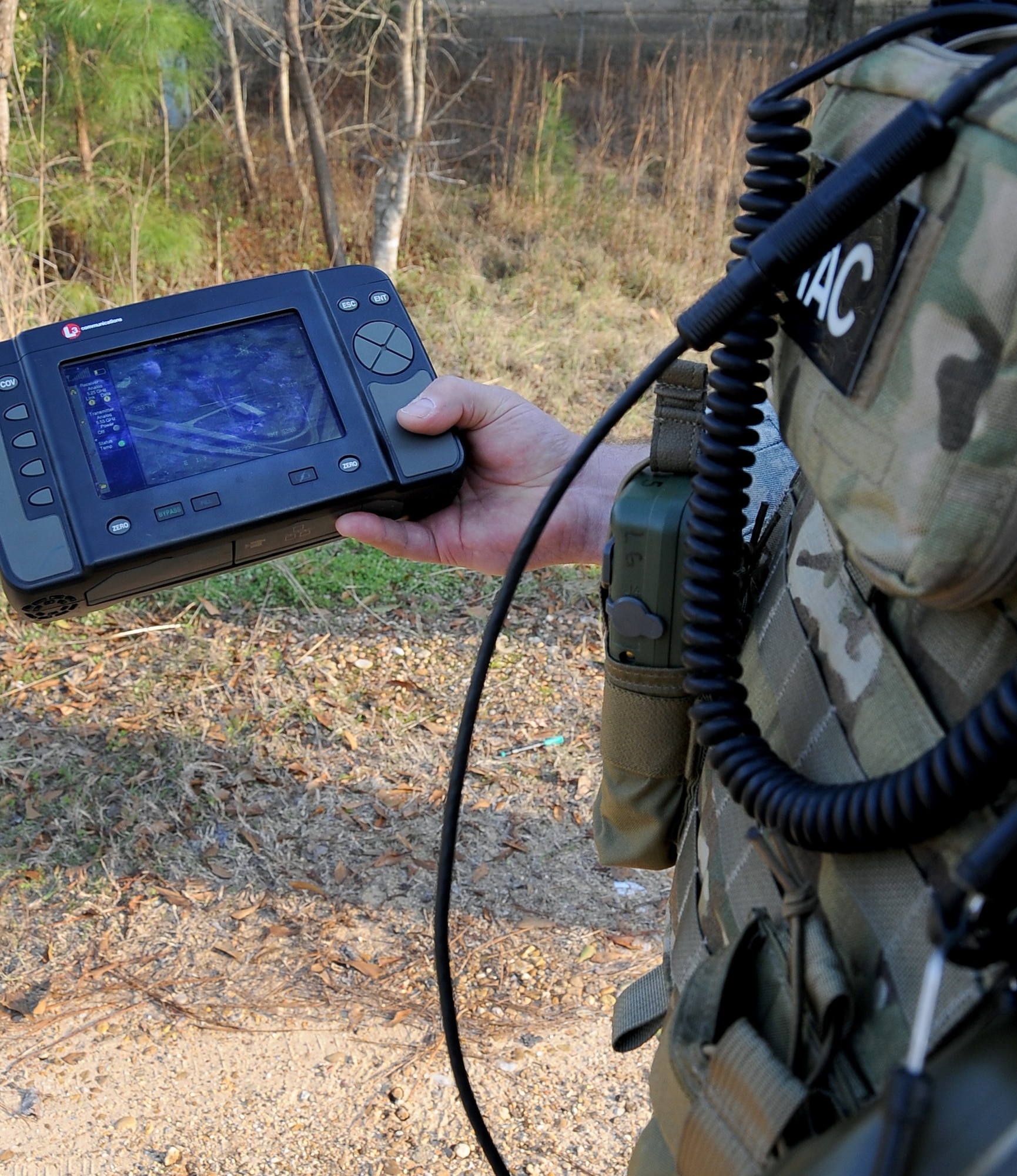 Tech. Sgt. Thomas Jenn, 19th Air Support Operations Squadron, Ft. Campbell, Ky., uses a handheld device to view what the F-16 Fighting Falcon pilot flying overhead sees on the ground during Green Flag East 13-03 in Leesville, La., Jan. 21. Six Joint Terminal Air Controllers participated in the exercise as a Tactical Air Control Party assisting F-16s from Shaw Air Force Base, S.C. (U.S. Air Force photo/Staff Sgt. Amber Ashcraft)