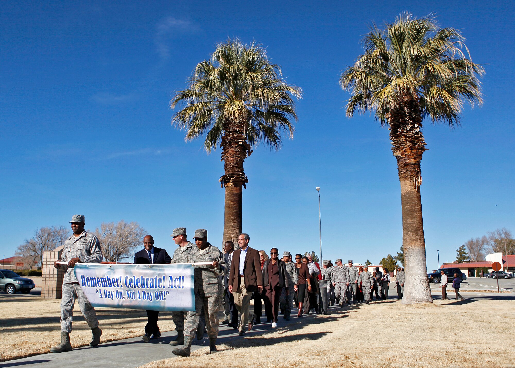 Members from the Edwards Air Force Base and NASA Dryden community participated in the annual march honoring Dr. Martin Luther King Jr. Jan. 17. Participants marched from the 412th Test Wing headquarters to Chapel 1 where a ceremony was held to honor the memory of the late civil rights leader. (U.S. Air Force photo by Jet Fabara)