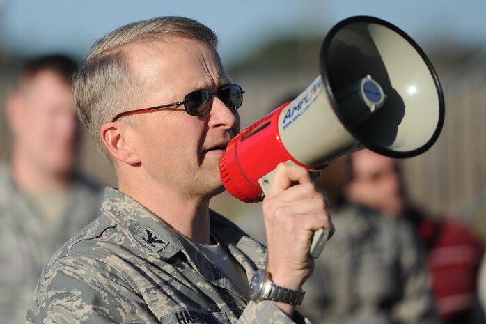 Col. Darren Hartford, 437th Airlift Wing commander, speaks before the Foreign Object Debris walk Jan. 17, 2013, at Joint Base Charleston - Air Base, S.C. Foreign object damage accounts for millions of dollars in repairs and replacement costs every year. ( Courtesy photo)
