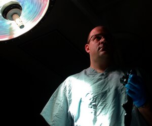 Dr. [Maj.] Gary Weissenfluh, 633rd Surgical Operations Squadron general surgeon, practices using a laparoscopic camera Jan. 17, 2013, at U.S. Langley Hospital Langley multiservice clinic, Langley Air Force Base, Va. The General Surgery Clinic specializes in repairing internal organs and its surgeons are certified to perform laparoscopic surgery, a relatively new minimal-access technique using cameras and instruments inserted through small incisions. (U.S. Air Force photo by Airman 1st Class R. Alex Durbin/Released)