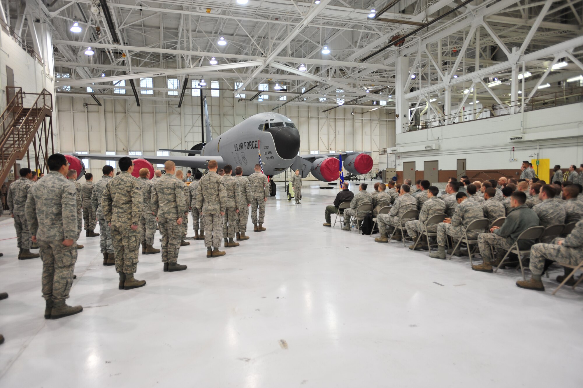 Members of the 22nd Aircraft Maintenance Squadron and guests from the 22nd Air Refueling Wing participate in an activation ceremony for two new aircraft maintenance units Jan. 15, 2013, McConnell Air Force Base, Kan. The two AMUs, “Black” and Gold,” will help increase leadership inside the 22nd AMXS and allow supervisors to provide more hands-on training for their Airmen. (U.S. Air Force photo/Airman 1st Class Colby L. Hardin)