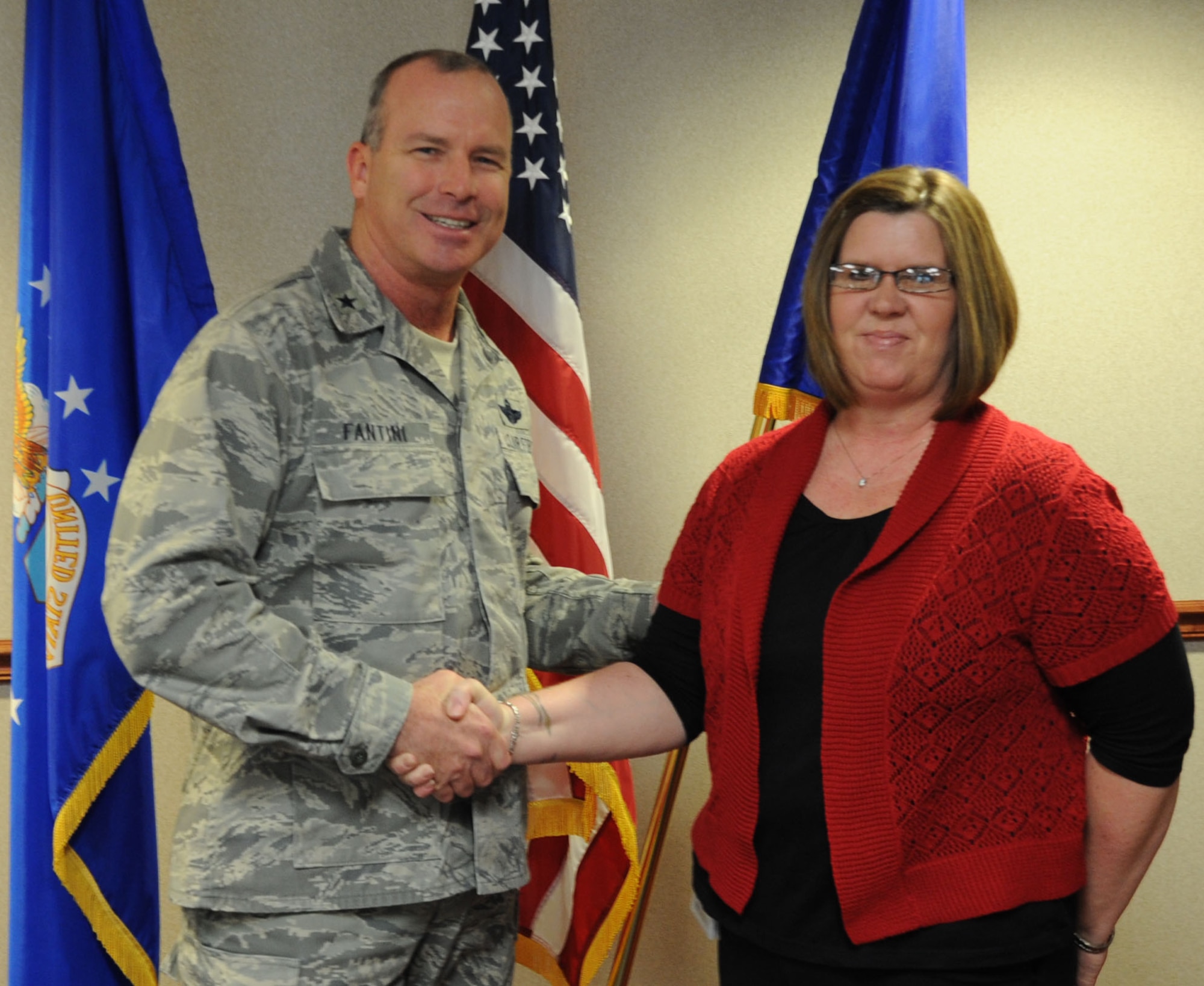 Brig. Gen. Michael Fantini (left), 82nd Training Wing commander, congratulates Melissa Guillory, 82nd Civil Engineering Squadron, on being named the "Wingman of Choice" for Jan. 21-25.  The award is given out weekly to individuals who demonstrate outstanding duty performance. (U.S. Air Force photo/A1C Jelani Gibson)