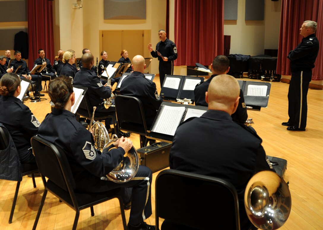 Chief Master Sgt. Ed Teleky, U.S. Air Force Band drum major, briefs members of the U.S. Air Force Band during a final rehearsal on Joint Base Anacostia-Bolling prior to the inaugural parade Jan. 21.  The bandsmen were rehearsing music for both the 57th Presidential Inauguration as well as a scheduled performance at the Commander in Chief Inaugural Ball. (U.S. Air Force photo/Senior Airman Bahja Joi Jones) 
