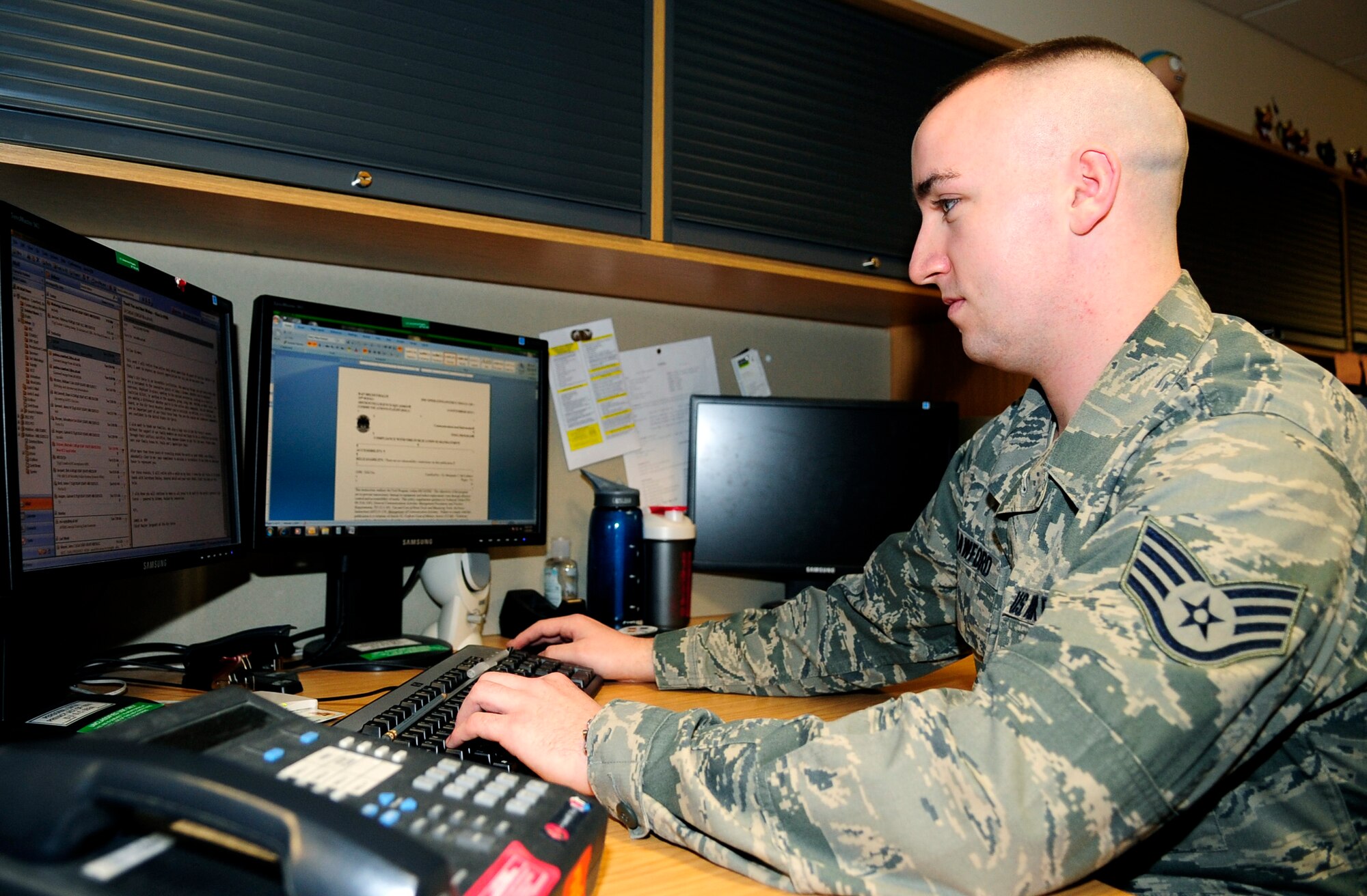 Staff Sgt. Joshua Crawford, 488th Intelligence Squadron network and ground mission systems technician, updates an operational instruction Jan. 23, 2013, at RAF Mildenhall, England. (U.S. Air Force photo by Airman 1st Class Dillon Johnston/Released)