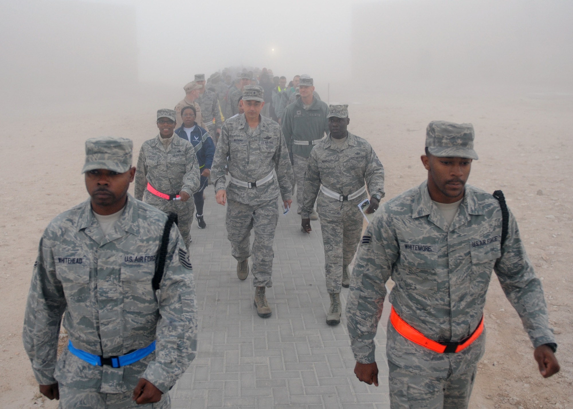 SOUTHWEST ASIA - Service members march to Memorial Plaza during Dr. Martin Luther King Jr. Day Jan. 21. The march was to commemorate the 50th anniversary of the march on Washington and celebrate the sacrifices King and other civil rights activists did for all. (U.S. Air Force photo/Senior Airman Joel Mease)
