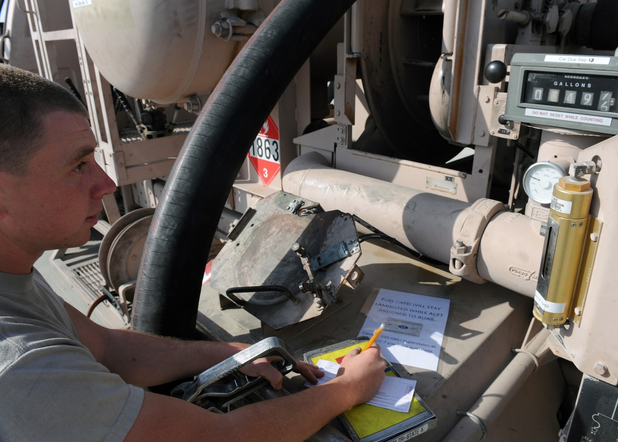 SOUTHWEST ASIA – Airman 1st Class Shelby Durham, 379th Expeditionary Logistics Readiness Squadron fuels distribution operator, completes a receipt after pumping roughly 140,000 pounds of fuel into a KC-135 Jan. 22. Durham pumped nearly a million gallons of jet fuel known as JP-8 during the past month. Shelby is deployed from the 673rd Logistics Readiness Squadron at Joint Base Elmendorf-Richardson, Alaska. (U.S. Air Force photo/Senior Airman Joel Mease)