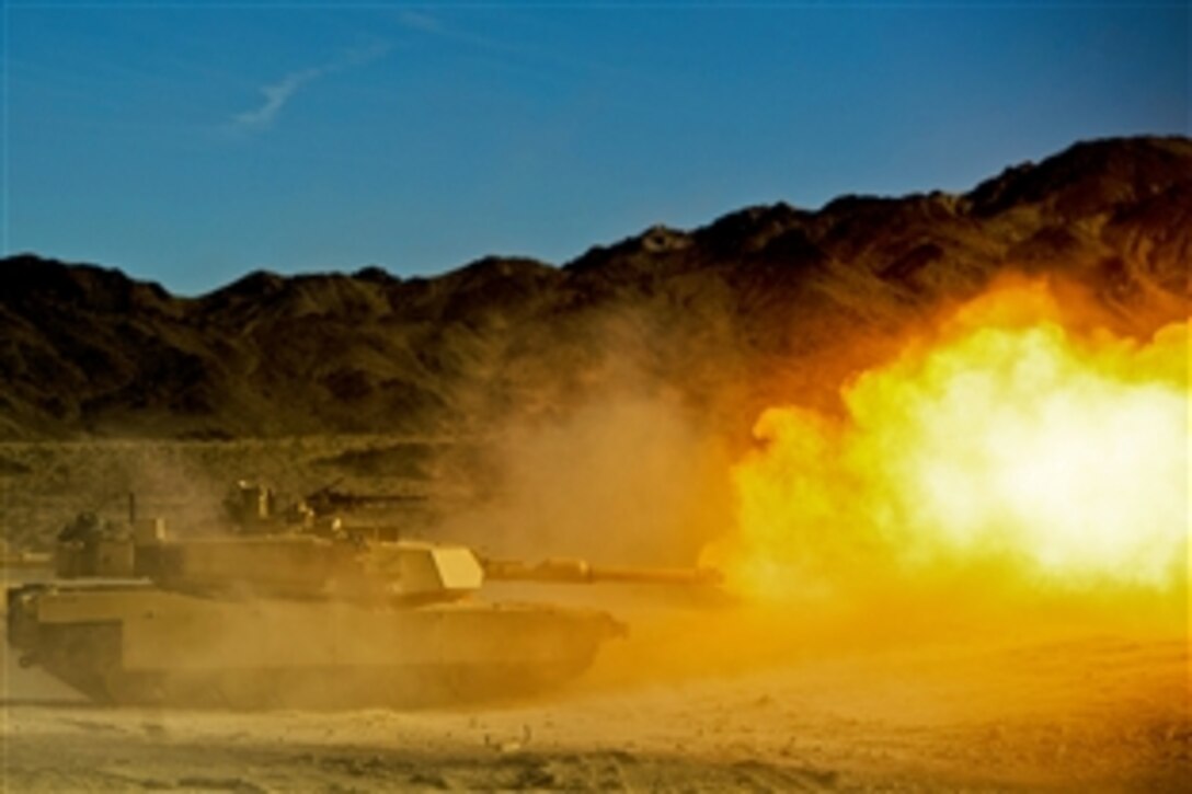 U.S. Marine Corps M1A1 Abrams tank provides suppressive fire against simulated insurgents during day 18 of the Integrated Training Exercise 13-1 at Twentynine Palms Marine Corps Base, Calif., Jan 22, 2013. Marines take the training before deploying. 