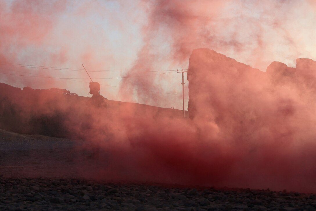 Captain Mastin Robeson, a team leader with the Security Force Assistance Advisor Team, Regimental Combat Team 7, from Greenville, S.C., stands next to Route 611 in preparation for a convoy pick up during Operation New Hope, Kajaki, Afghanistan, Jan. 18. During the three-day operation, more than 100 Afghan National Army soldiers along with various Afghan National Security Forces elements cleared weapons caches, improvised explosive devices and enemy fighting positions from the area. Accompanying the ANA were 18 Marine advisors providing call for fires and tactical input when needed. Afghan National Security Forces localized their efforts to Kajaki Sofala, part of the southern green zone in Kajaki and a known insurgent hotbed in the district.
