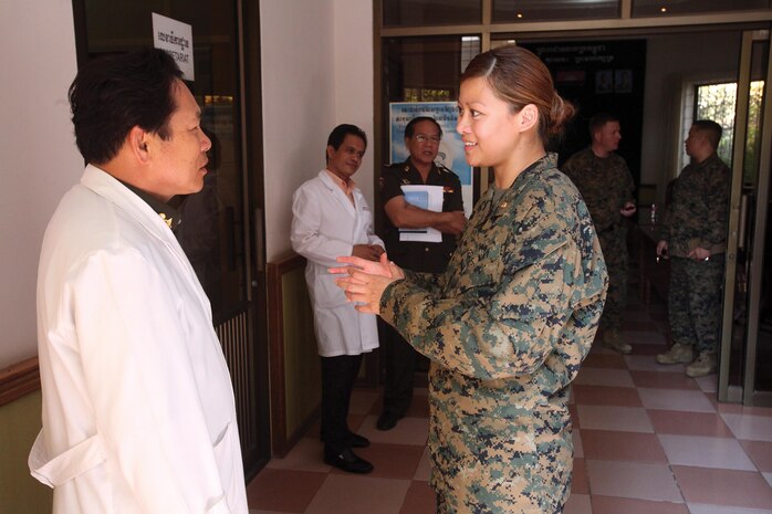 U.S. Navy Lt. Kim Nguyen, right, speaks with Royal Cambodian Army Lt. Gen. Sovan Ly at the Phnom Penh Preah Ket Melea Hospital Jan. 22 during Cambodia Medical Exercise 13:1. The U.S. service members will work alongside Royal Cambodia Armed Forces medical personnel during subject-matter expert exchanges to increase Cambodian and U.S. medical capabilities, capacity and interoperability. The U.S. and Cambodian armed forces have conducted medical exercises together since 2007. Nguyen is a surgeon with 3rd Medical Battalion, Combat Logistics Regiment 35, 3rd Marine Logistics Group, III Marine Expeditionary Force. Ly is the director of the hospital. 
