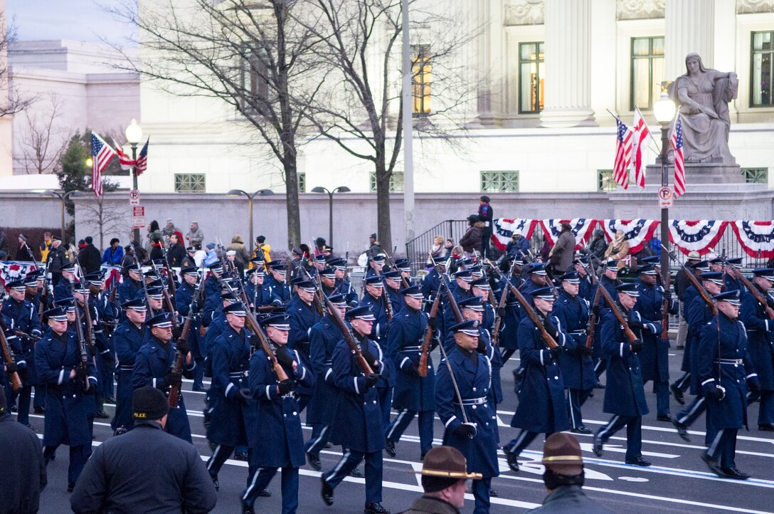 The United States Air Force Honor Guard marches along Pennsylvania Avenue in Washington during the 57th Presidential Inaugural Parade Jan. 21, 2013. Military support for the Inauguration is designed to honor the commander in chief, recognize civilian control of the military and celebrate democracy. (U.S. Air Force photo by 1st Lt. Ashleigh Peck) 