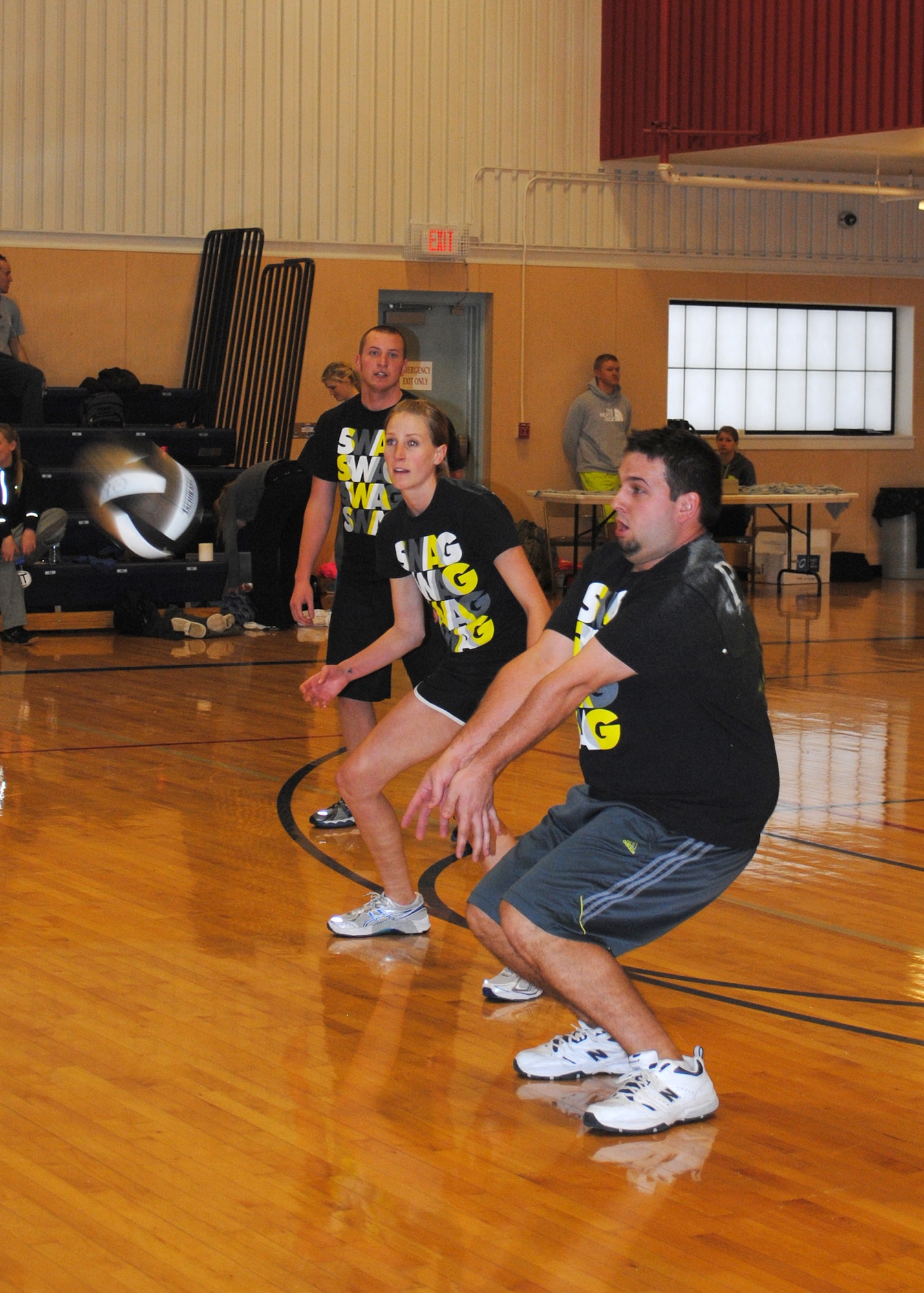 Members of one of the teams participating in the Ace in the Hole volleyball tournament prepare to hit the incoming volleyball.  These members traveled all the way from Butte to participate in the tournament Jan. 19 and 20.  (U.S. Air Force photo/Senior Airman Cortney Paxton)
