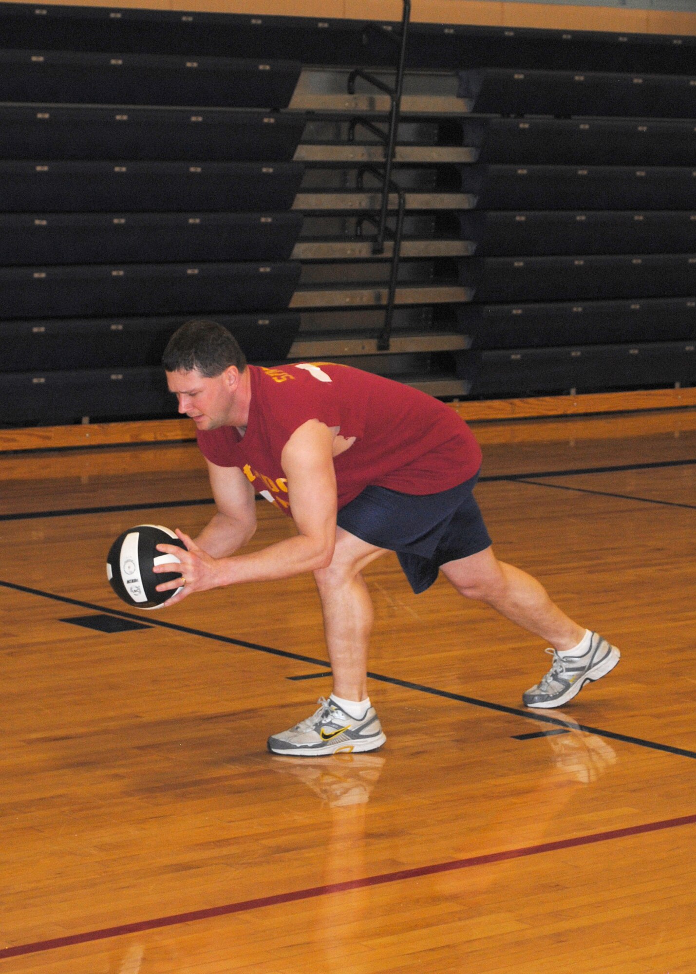 Master Sgt. Nick Sinnot, 341st Medical Support Squadron NCO in charge of bioenvironmental, prepares to serve the ball during the volleyball tournament Jan. 19.  (U.S. Air Force photo/Senior Airman Cortney Paxton)