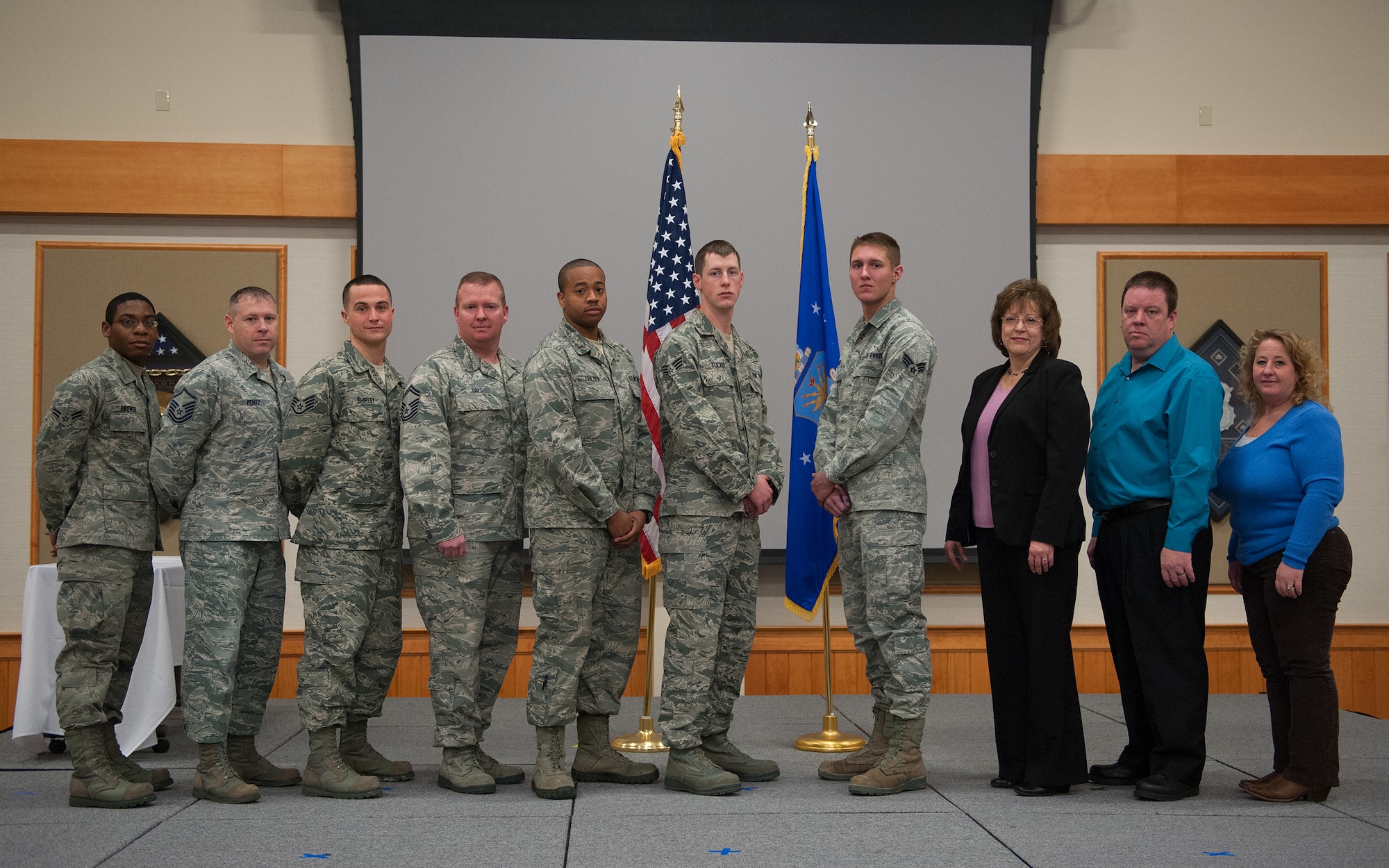 Team Malmstrom recognized winners of the 4th Quarterly Awards at a breakfast at the Grizzly Bend on Jan. 15. Standing from left to right are Dormitory Room of the Quarter winner Airman 1st Class Lester Brewer, 341st Logistics Readiness Squadron; Team of the Quarter representative, Master Sgt. Jason Pentz, 341st Maintenance Group; NCO of the Quarter, Staff Sgt. Steven Shirley, 819th Red Horse Squadron; Senior NCO of the Quarter, Senior Master Sgt. Jerry Hall, 341st Mission
Support Group; Team of the Quarter representative, 2nd Lt. Charles Frazier, 341st
Maintenance Group; Airman of the Quarter, Senior Airman Andrew Tucker, 819th RHS; Dormitory of the Quarter representative, Senior Airman Jacob Hinz, 341st Civil Engineer Squadron; Civilian Supervisory Category II, winner Terry Annette, 341st MSG; Civilian Supervisory Category I, winner Kenneth Sanders, 341st MSG; Civilian Category II, winner Cammie Maloney, 341st Medical Group
(U.S. Air Force photo/Beau Wade)
