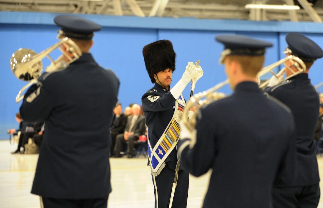 Chief Master Sgt. Ed Teleky, U.S. Air Force Band drum major leads the U.S. Air Force Band in the National Anthem during the Chief Master Sergeant of the Air Force Transition Ceremony at Joint Base Andrews, Md., Jan. 24, 2013. CMSAF James A. Cody became the 17th CMSAF following the retirement of CMSAF. James Roy. Roy's retirement culminated more than 30 years of service. (U.S. Air Force photo/ Staff Sgt. Nichelle Anderson)