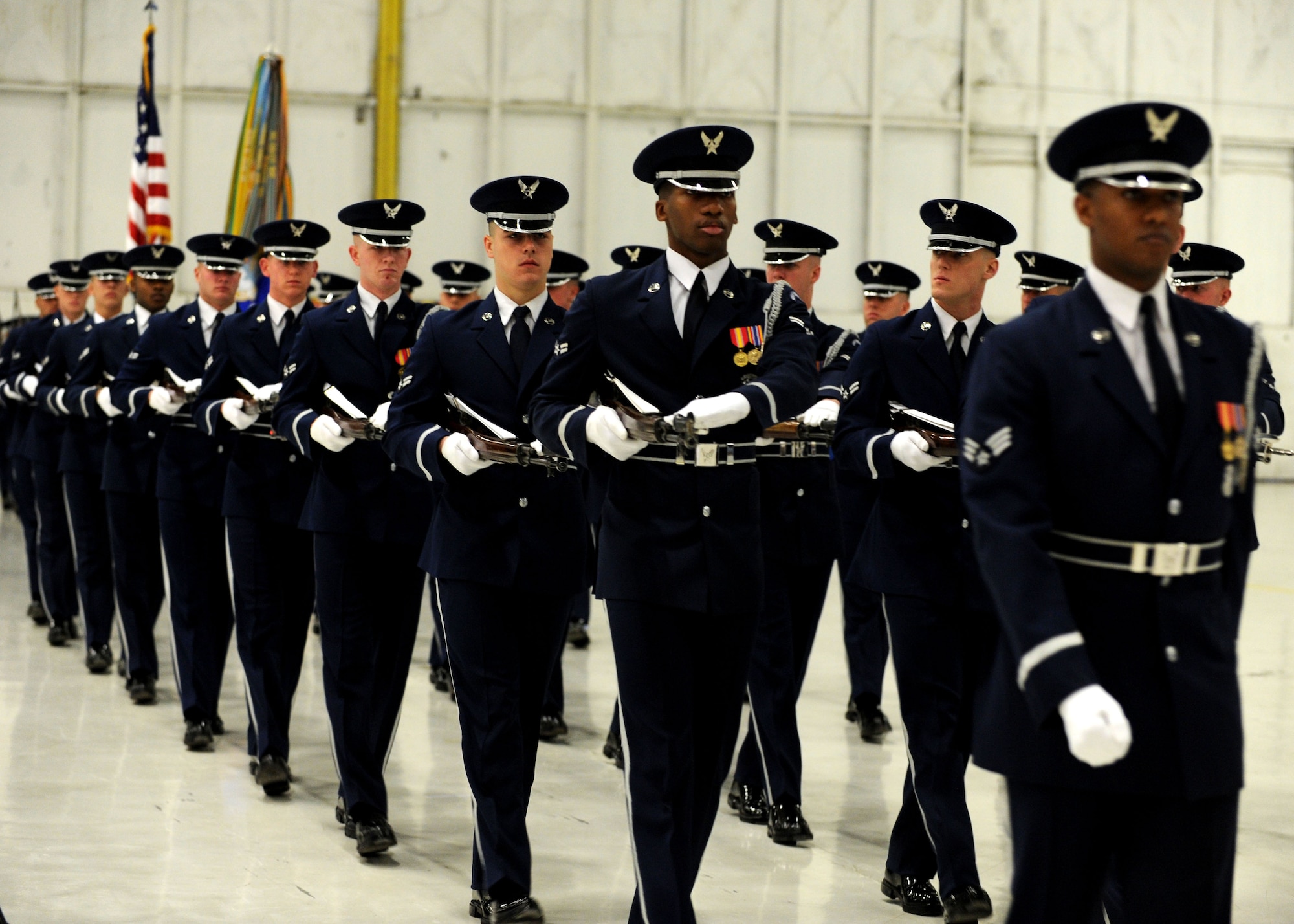 Members of the U.S. Air Force Honor Guard perform a Pass in Review for retiring Chief Master Sergeant of the Air Force James A. Roy during the Chief Master Sergeant of the Air Force Transition Ceremony on Joint Base Andrews, Md., on Jan. 24, 2013. The U.S. Air Force Band and Honor Guard honored Chief Master Sgt. Roy and welcomed Chief Master Sergeant of the Air Force James A. Cody during the ceremony. (U.S. Air Force photo/ Senior Airman Bahja Joi Jones)