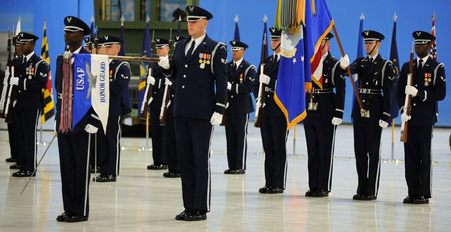 Members of the U.S. Air Force Honor Guard  present arms at a Chief Master Sergeant of the Air Force Transition Ceremony on Joint Base Andrews, Md., on Jan. 24, 2013. The U.S. Air Force Band and Honor Guard honored the retiring Chief Master Sergeant of the Air Force James A. Roy and welcomed Chief Master Sergeant of the Air Force James A. Cody during the ceremony. (U.S. Air Force photo/ Senior Airman Bahja Joi Jones)