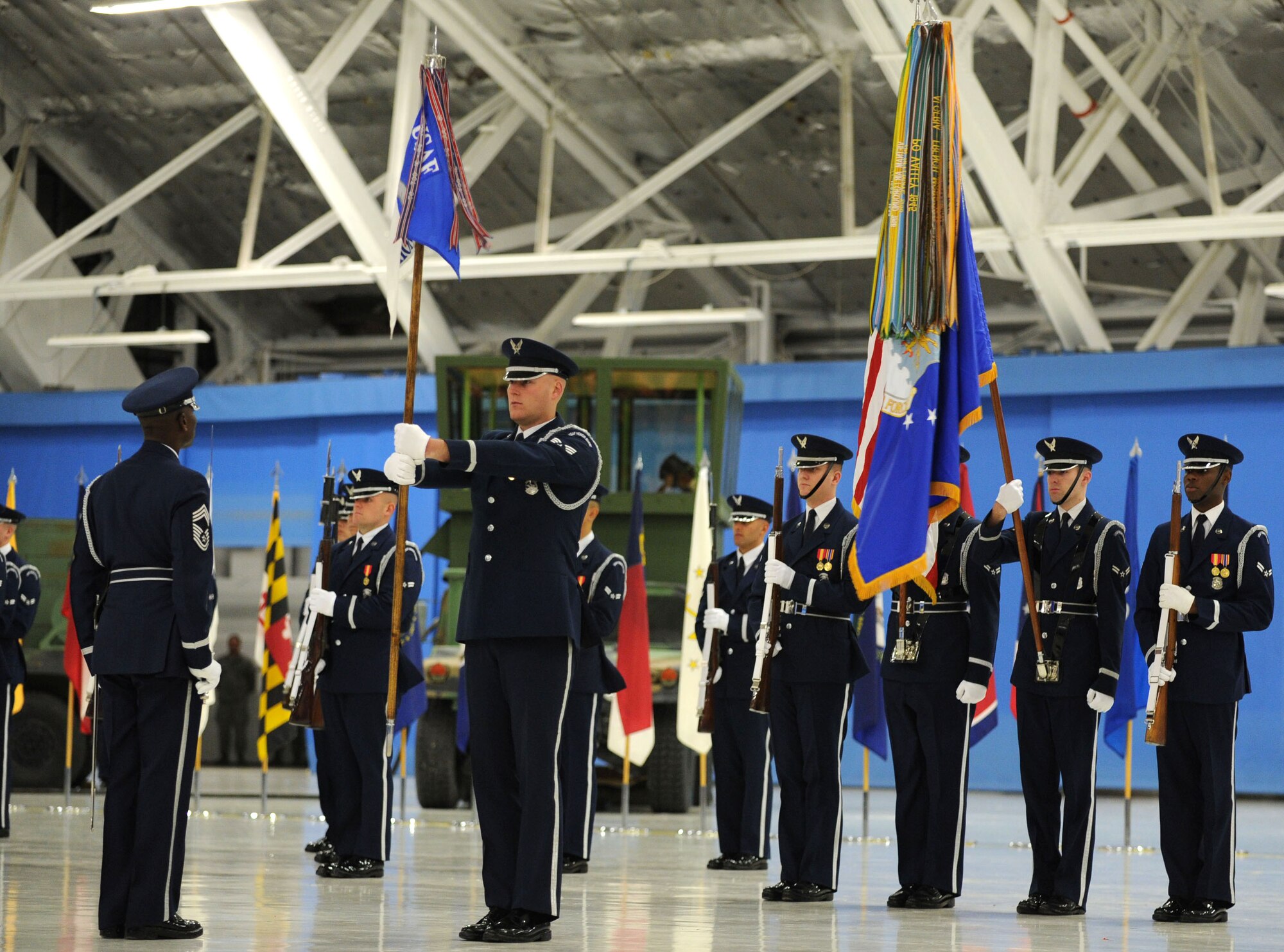 Members of the U.S. Air Force Honor Guard  present arms at a Chief Master Sergeant of the Air Force Transition Ceremony on Joint Base Andrews, Md., on Jan. 24, 2013. The U.S. Air Force Band and Honor Guard honored the retiring Chief Master Sergeant of the Air Force James A. Roy and welcomed Chief Master Sergeant of the Air Force James A. Cody during the ceremony. (U.S. Air Force photo/ Senior Airman Bahja Joi Jones)