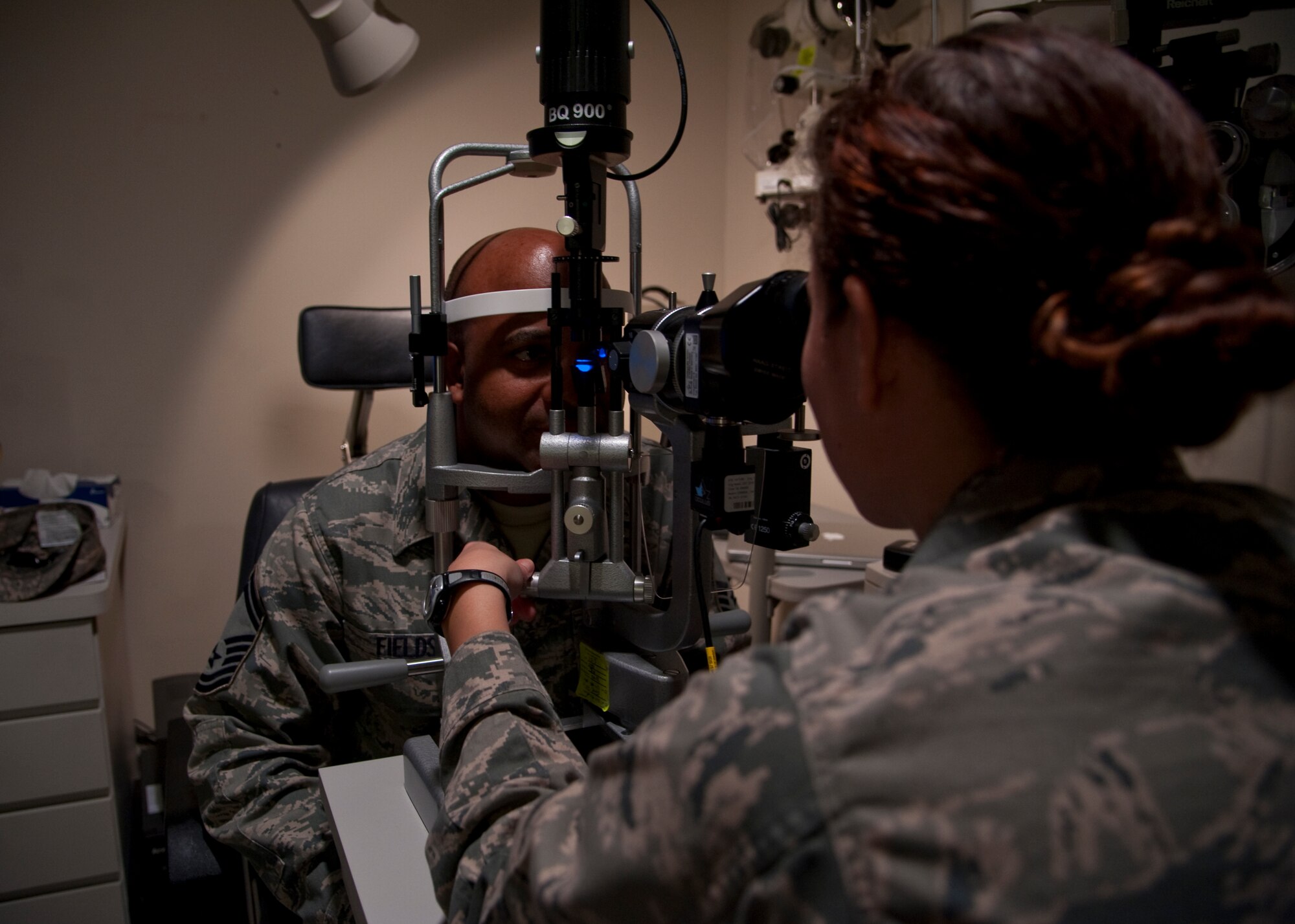 U.S. Air Force Capt. Nikki Lagendyk, chief of clinical operations of 1st Special Operations Aerospace Medicine Squadron, examines the eyes of Senior Master Sgt. Lawrence Fields, an inspector general operation supervisor of Air Force Special Operations Command Headquarters, during a routine check-up at the Optometry Clinic on Hurlburt Field, Fla., Jan. 16, 2013. “The eyes are the window to the health of the body,” said Lagendyk. “We look at the blood vessels and diagnose things like high blood pressure, diabetes, and thyroid problems just by looking at the eye.” (U.S. Air Force photo/ Airman 1st Class Nigel Sandridge) 