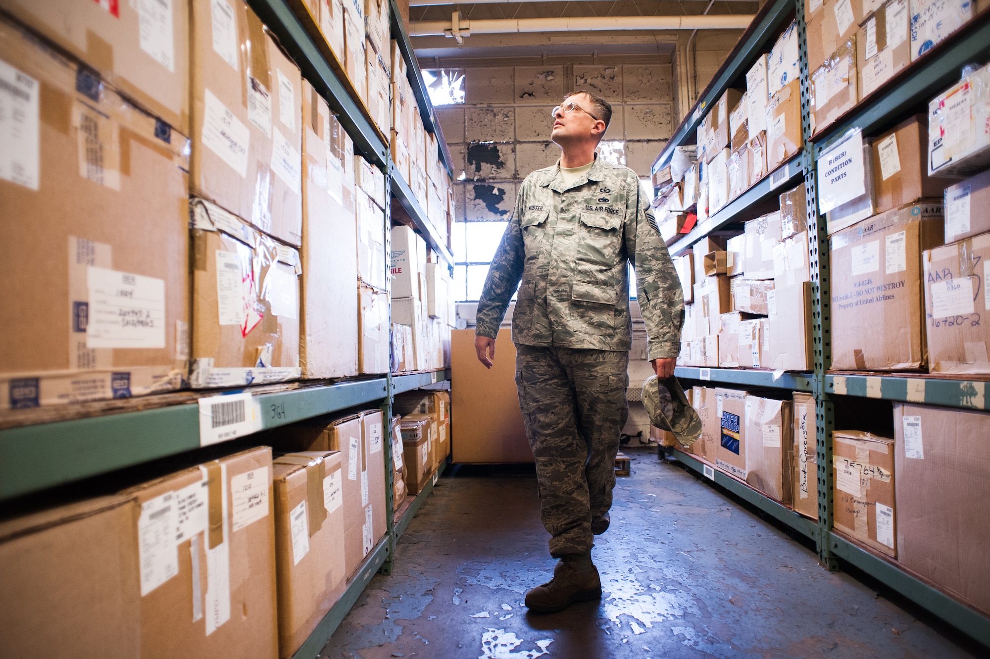 Master Sgt. Scott Keister, Joint Base McGuire-Dix-Lakehurst Safety Office non-commissioned officer in charge, performs a walk-through inspection Jan. 9, 2013, at a warehouse on JB MDL, N.J. The office conducts spot inspections for hazard identification and safety issues. Their main goal is for mishap prevention by detecting potential areas and educating the workforce of them. Keister hails from Lawrenceville, Pa. (U.S. Air Force photo by Russ Meseroll/Released)