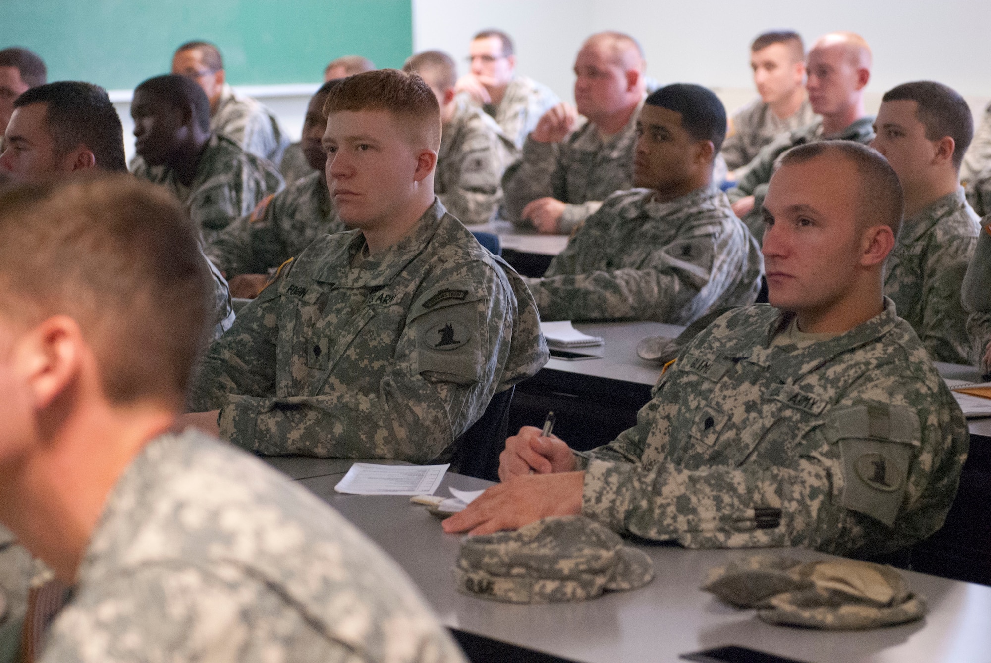 Soldiers of the 153rd Military Police Company headquartered in Delaware City, Del., train on the basics of cultural advising in a classroom setting Jan. 17, 2013, prior to their collective field exercises at Joint Base McGuire-Dix-Lakehurst, N.J. The 174th Infantry Brigade stationed at JB MDL and the 162nd Inf. Bde., from Fort Polk, La., teamed up to provide the unit police mentorship training to employ downrange soon. (U.S. Army photo by Sgt. 1st Class Stan Maszczak/Released)