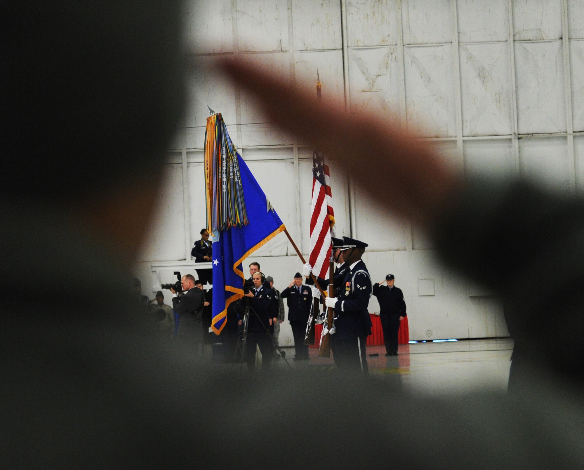 Col. Bill Knight, 11th Wing/Joint Base Andrews commander, salutes the colors during the Chief Master Sergeant of the Air Force Transition Ceremony on Joint Base Andrews, Md., Jan. 24, 2013. The 11th Wing hosted the event.(U.S. Air Force photo/ Airman 1st Class Nesha Humes)(Released)