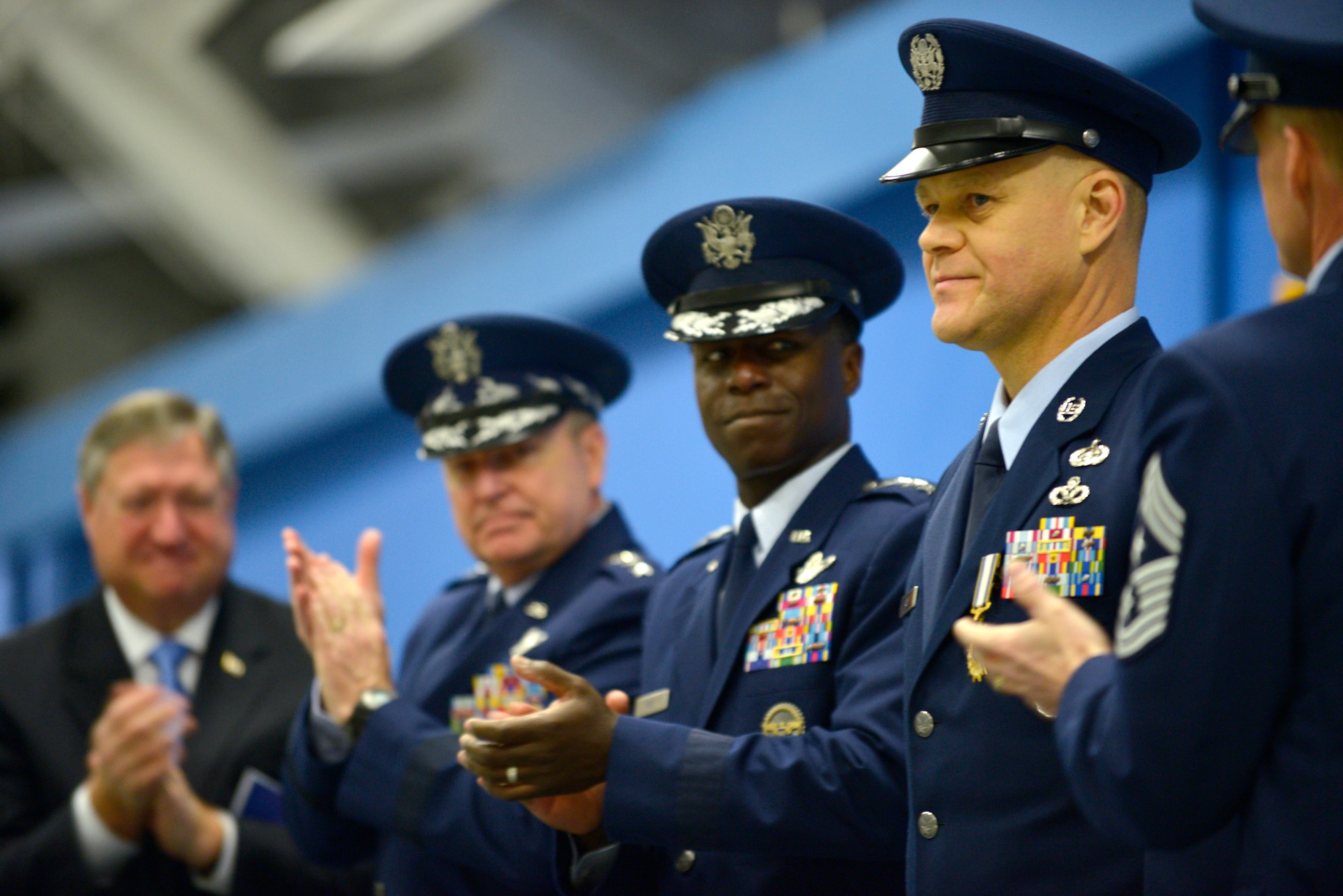 Secretary of the Air Force, Michael Donley, Air Force Chief of Staff Gen. Mark A. Welsh III, and Commander Air Education and Training Command Gen. Edward A. Rice Jr. congratulate Chief Master Sgt. of the Air Force James Roy as he retires after more than 30 years of service at Joint Base Andrews, Md., on Jan. 24, 2013. (U.S. Air Force photo/Master Sgt. Cecilio Ricardo)