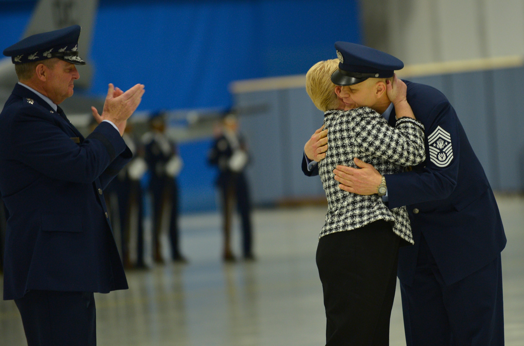 Air Force Chief of Staff Gen. Mark A. Welsh III, applauds as the 16th Chief Master Sgt. of the Air Force James Roy thanks his wife, Paula, during the retirement and transition ceremony at Joint Base Andrews, Md., Jan. 24, 2013. (U.S. Air Force photo/Master Sgt. Cecilio Ricardo)