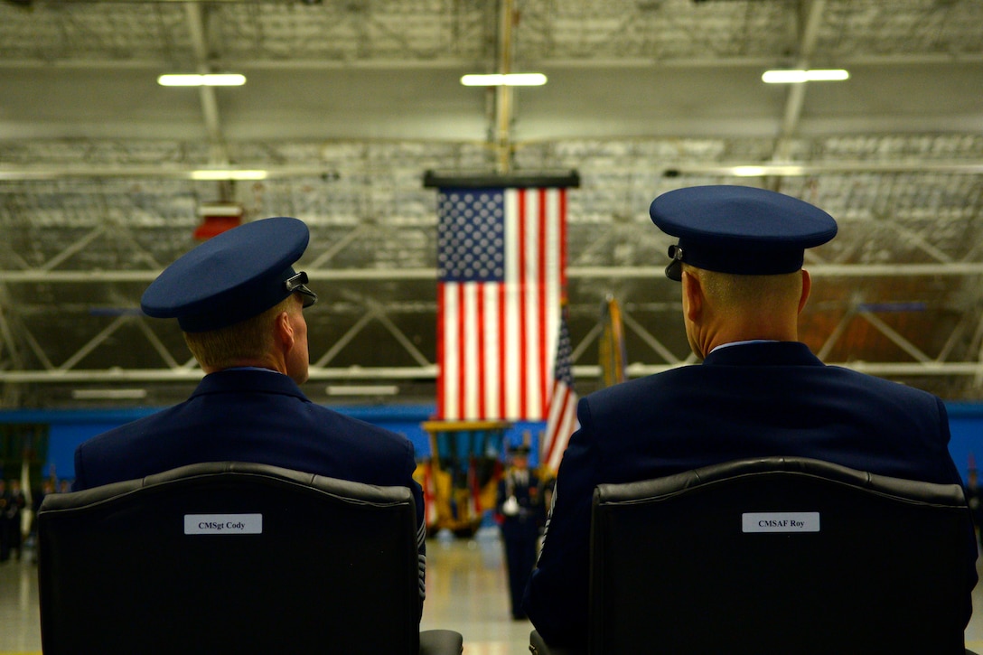 Chief Master Sgt. of the Air Force James Cody and the 16th Chief Master Sgt. of the Air Force (ret.) James Roy watch as the colors are posted during the retirement and transition ceremony at Joint Base Andrews, Md., Jan. 24, 2013. (U.S. Air Force photo/Master Sgt. Cecilio Ricardo)