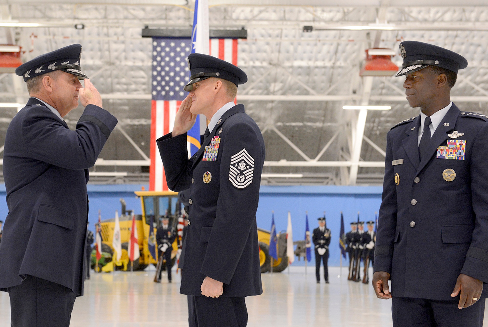 Air Force Chief of Staff Gen. Mark A. Welsh III, left, and Gen. Edward A. Rice Jr., the commander of Air Education and Training Command, congratulate the 17th Chief Master Sgt. of the Air Force James Cody during a transition ceremony at Joint Base Andrews, Md., on Jan. 24, 2013. (U.S. Air Force photo/Scott M. Ash)