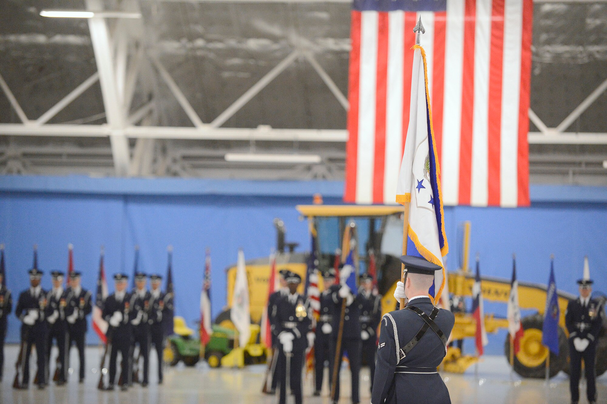 The new flag representing the office of the chief master sergeant of the Air Force is displayed before several hundred Airmen attending the transition ceremony which retired Chief Master Sgt. of the Air Force James Roy and welcomed the 17th person to hold that position, James Cody, during a ceremony at Joint Base Andrews, Md., on Jan. 24, 2013.  (U.S. Air Force photo/Scott M. Ash)