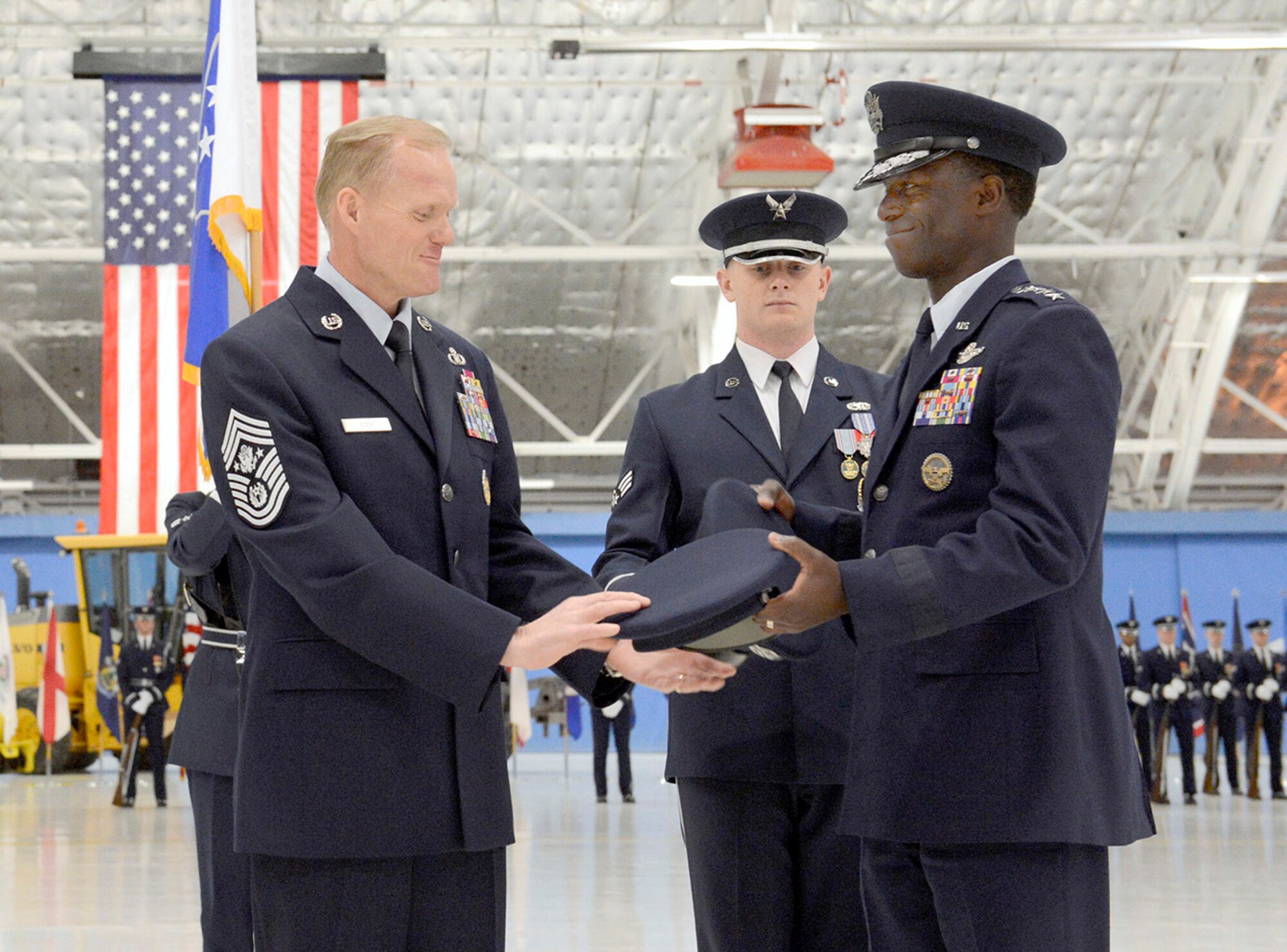 Chief Master Sgt. James Cody receives his wheel cap from Gen. Edward A. Rice Jr., commander of Air Education and Training Command during a transition ceremony at Joint Base Andrews, Md., on Jan 24, 2013.  Cody is the 17th chief master sergeant of the Air Force. (U.S. Air Force photo/Scott M. Ash)