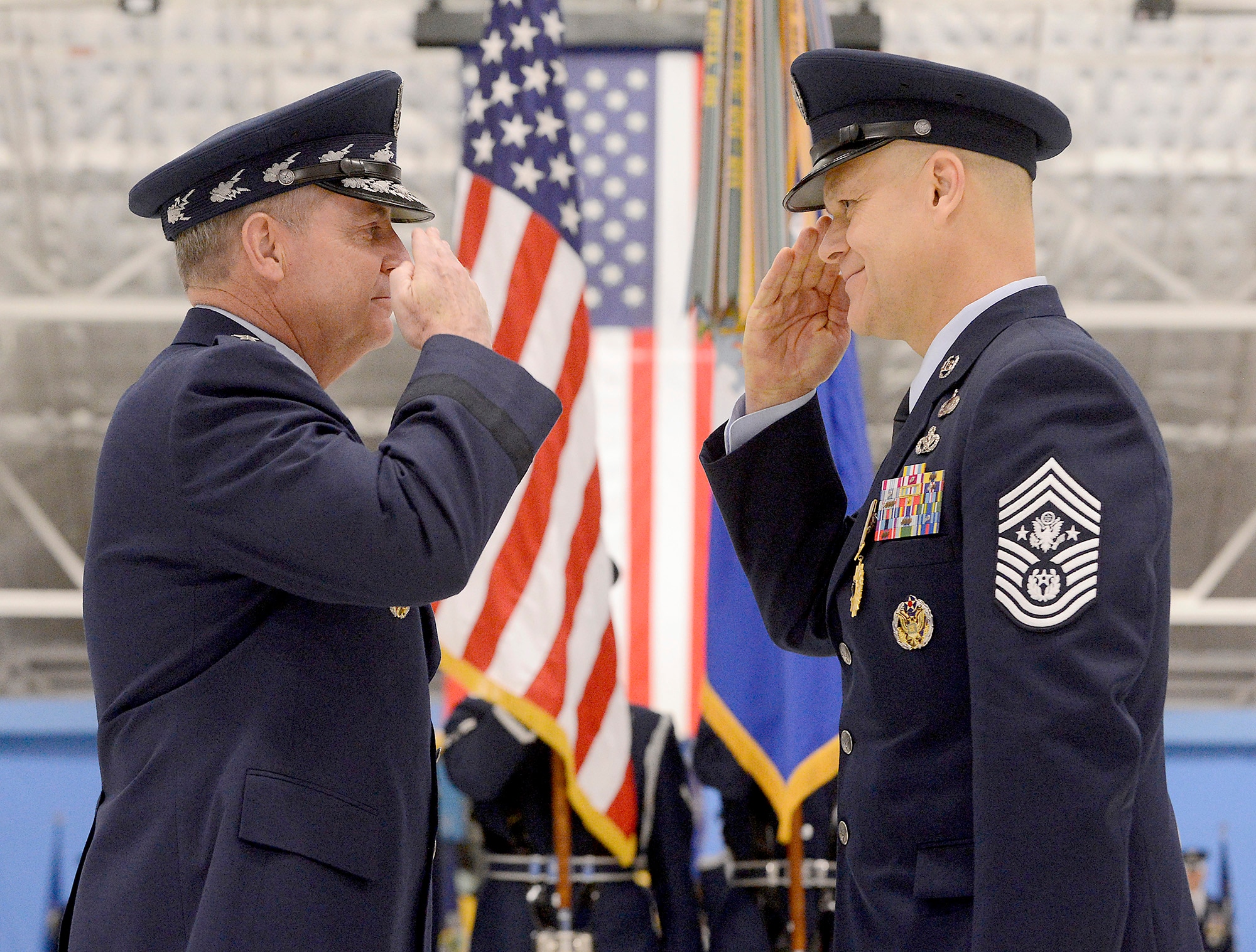 Air Force Chief of Staff Gen. Mark A. Welsh III congratulates Chief Master Sgt. of the Air Force James Roy at Joint Base Andrews, Md., on Jan. 24, 2013, during his retirement ceremony.   (U.S. Air Force photo/Scott M. Ash)