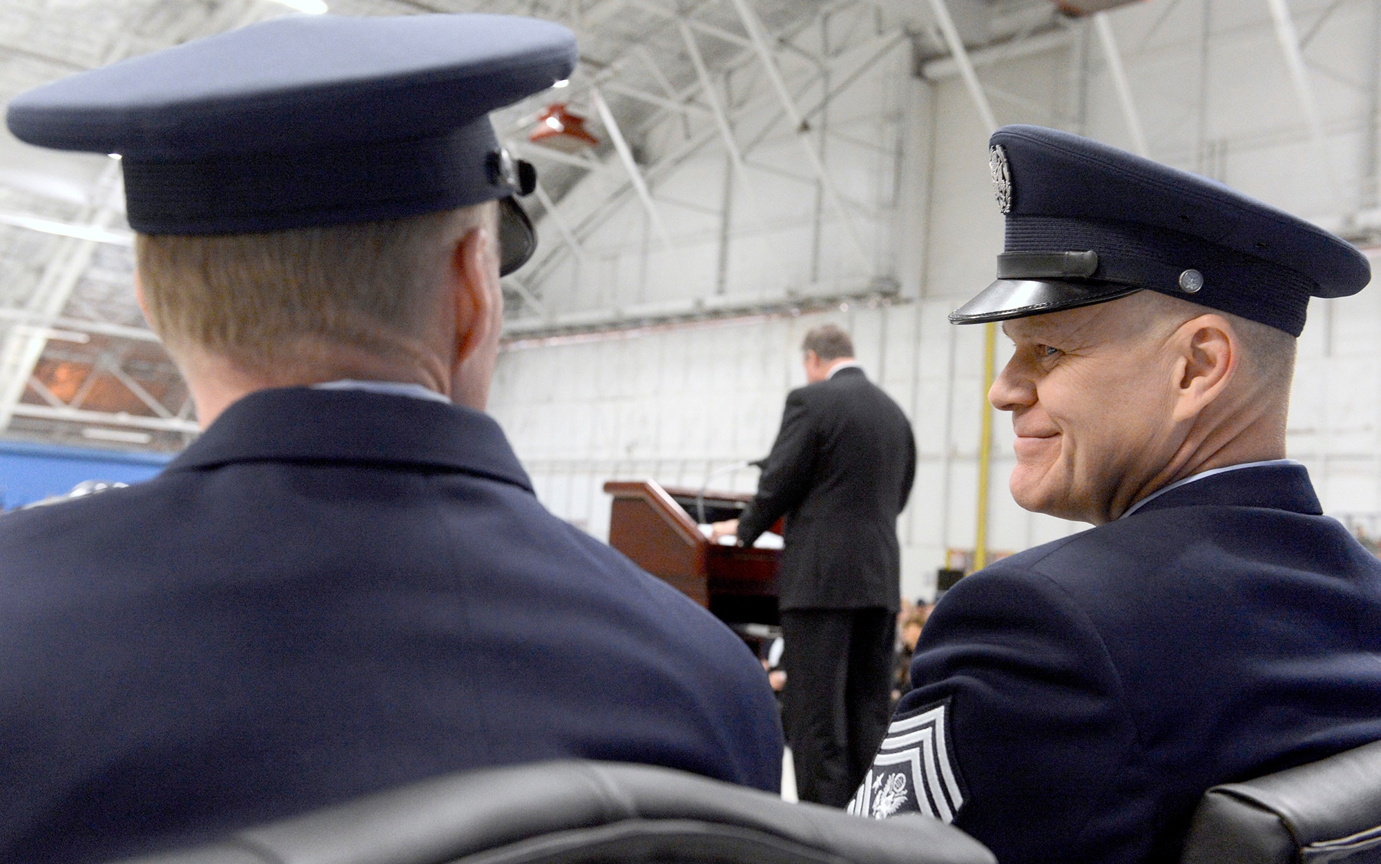 Chief Master Sgt. of the Air Force James Roy encourages his successor Chief Master Sgt. James Cody during their transition ceremony while Secretary of the Air Force Michael Donley congratulates them at Joint Base Andrews, Md., Jan. 24, 2013.   (U.S. Air Force photo/Scott M. Ash)