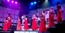 Tops in Blue singers perform during a show at the Mathis Auditorium, Valdosta, Ga., Jan. 18, 2013. The group travels worldwide to remote and deployed locations to help raise the morale for service members and their families. (U.S. Air Force photo by Airman Alexis Grotz/Released)