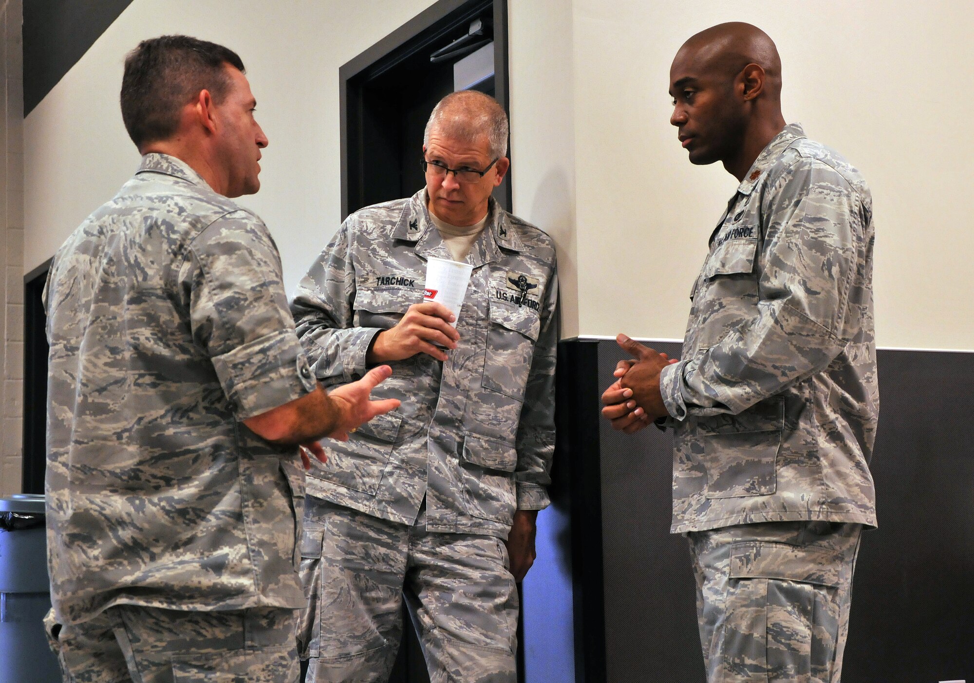Col. Timothy Tarchick, 94th Airlift Wing commander, Lt. Col. Scott Carlin, 94th Civil Engineering Squadron commander, and Maj. Toney Collins, 94th Logistics Readiness Squadron director of operations, go over the last minute details of the trip to Silver Flag, Jan. 11. Twenty-eight Airmen from the 94th Civil Engineering Squadron departed from Dobbins Air Reserve Base for a Silver Flag exercise at Tyndall Air Force Base, Fla. (U.S. Air Force photo/Senior Airman Elizabeth Van Patten)