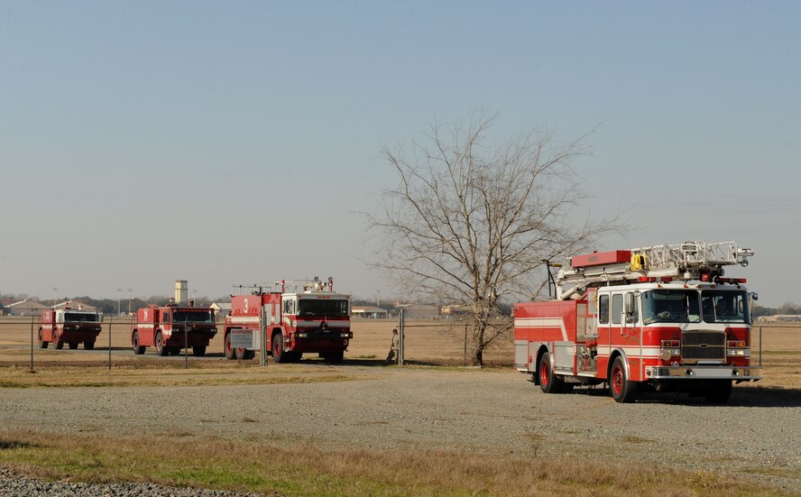 Firefighters from the 2nd Civil Engineer Squadron operate four fire trucks on Barksdale Air Force Base, La., Jan. 23. Firefighters must respond at a moment's notice to aircraft and structure fires. (U.S. Air Force photo/Airman 1st Class Benjamin Gonsier)
