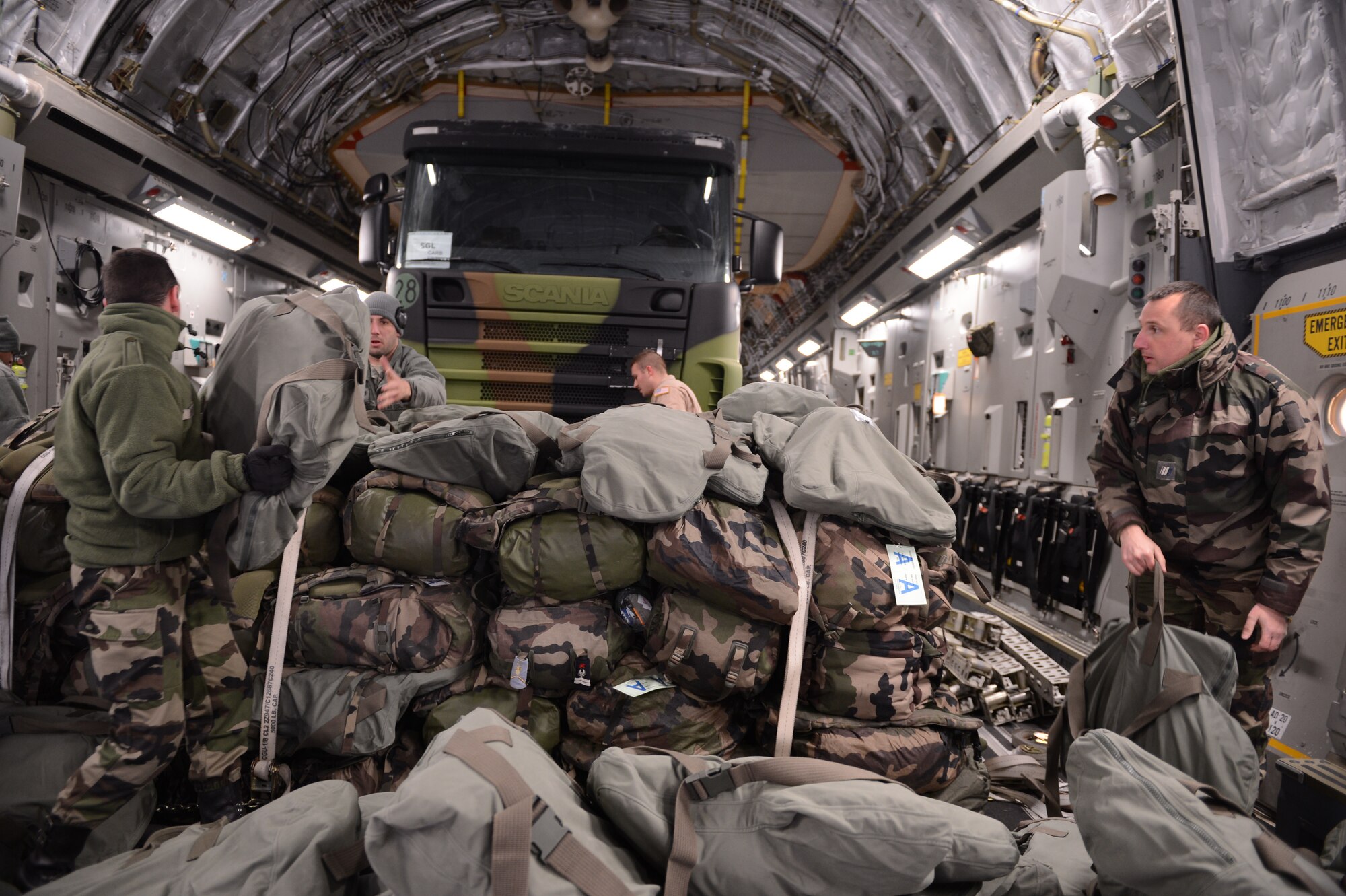 ISTRES, France -- Several French soldiers march to a U.S. Air Force C-17 Globemaster III here Jan. 20, 2013. The U.S. Air Force is transporting personnel to Mali in support of France's efforts to remove extremists who have taken control of the northern part of the country.  (U.S. Air Force photo by Senior Airman James Richardson) (Released)

